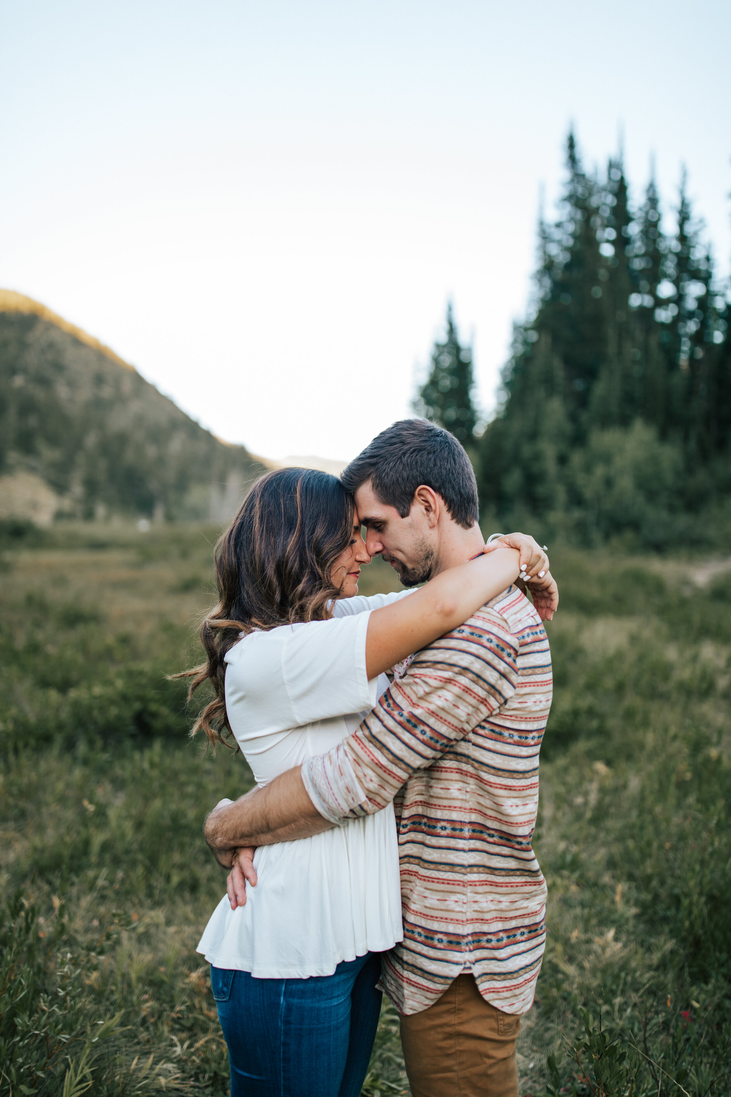  Summer engagement session in Big Cottonwood Canyon at Jordan Pines. Casual summer outfits. Utah summer photoshoot locations. Summer couple session in Salt Lake City, Utah. Engagement shoot locations in Utah. Best places for engagement photos in Utah