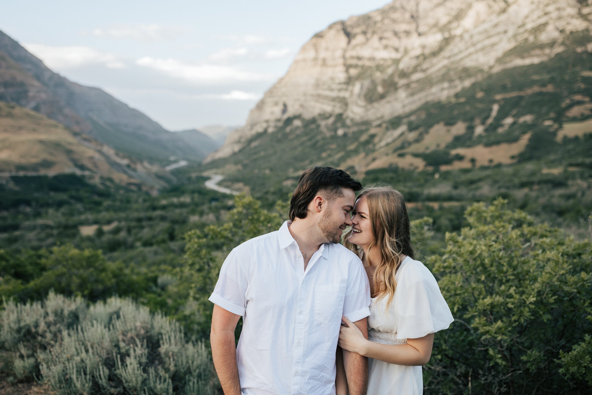  Summer anniversary couples session in the mountains. A young couple walks around the mountains. Utah photographer. Engagement session. #utahphotographer #utahengagements  