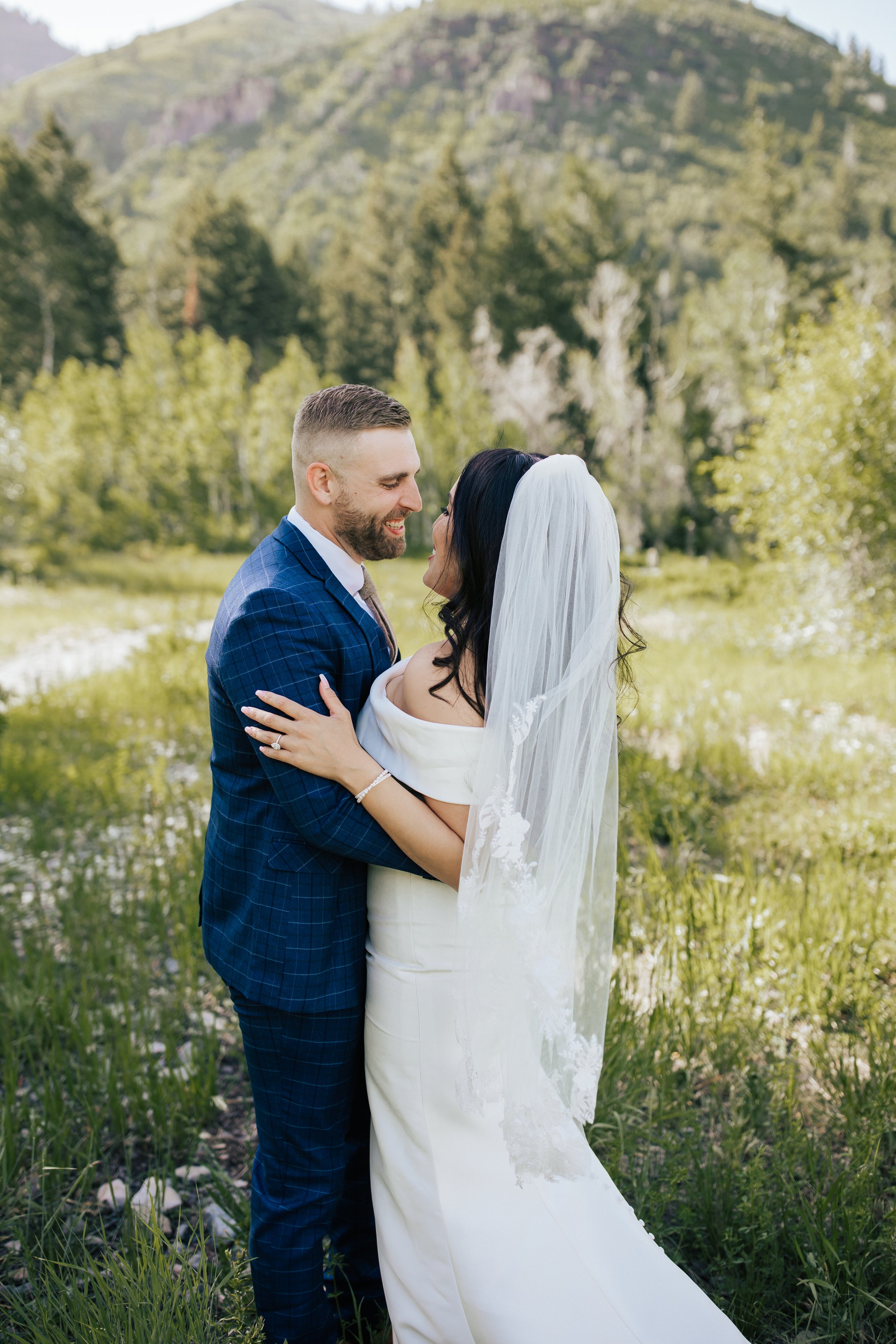  First look session with bride and groom before their wedding ceremony in Aspen Grove, Provo Canyon, Utah. #weddingdress #firstlook #bridalportraits 