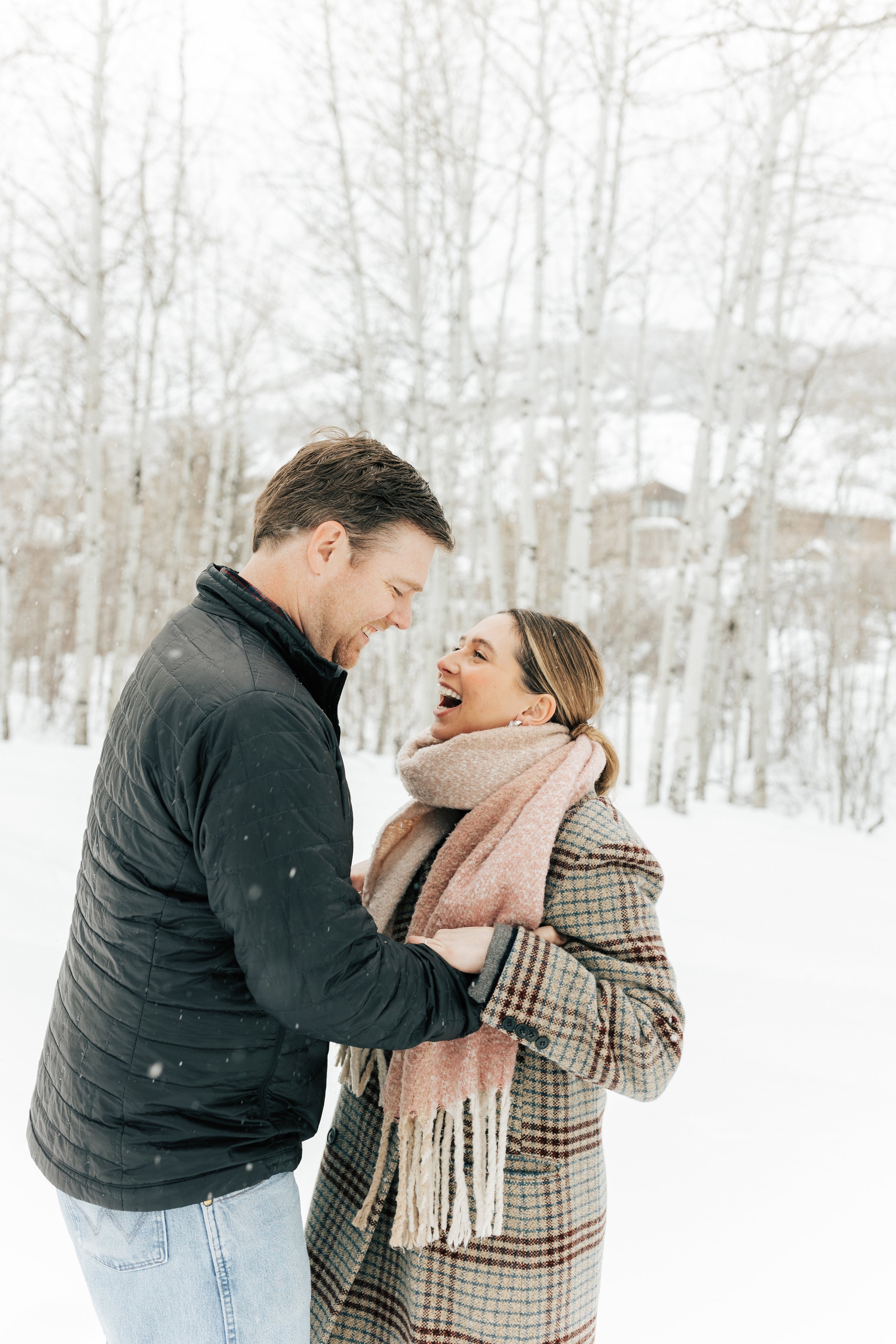  Winter engagement session in Park City, Utah. Boyfriend surprises girlfriend with wedding proposal during a snowy photoshoot. #parkcity #engagements #engagementsessionn #proposal 