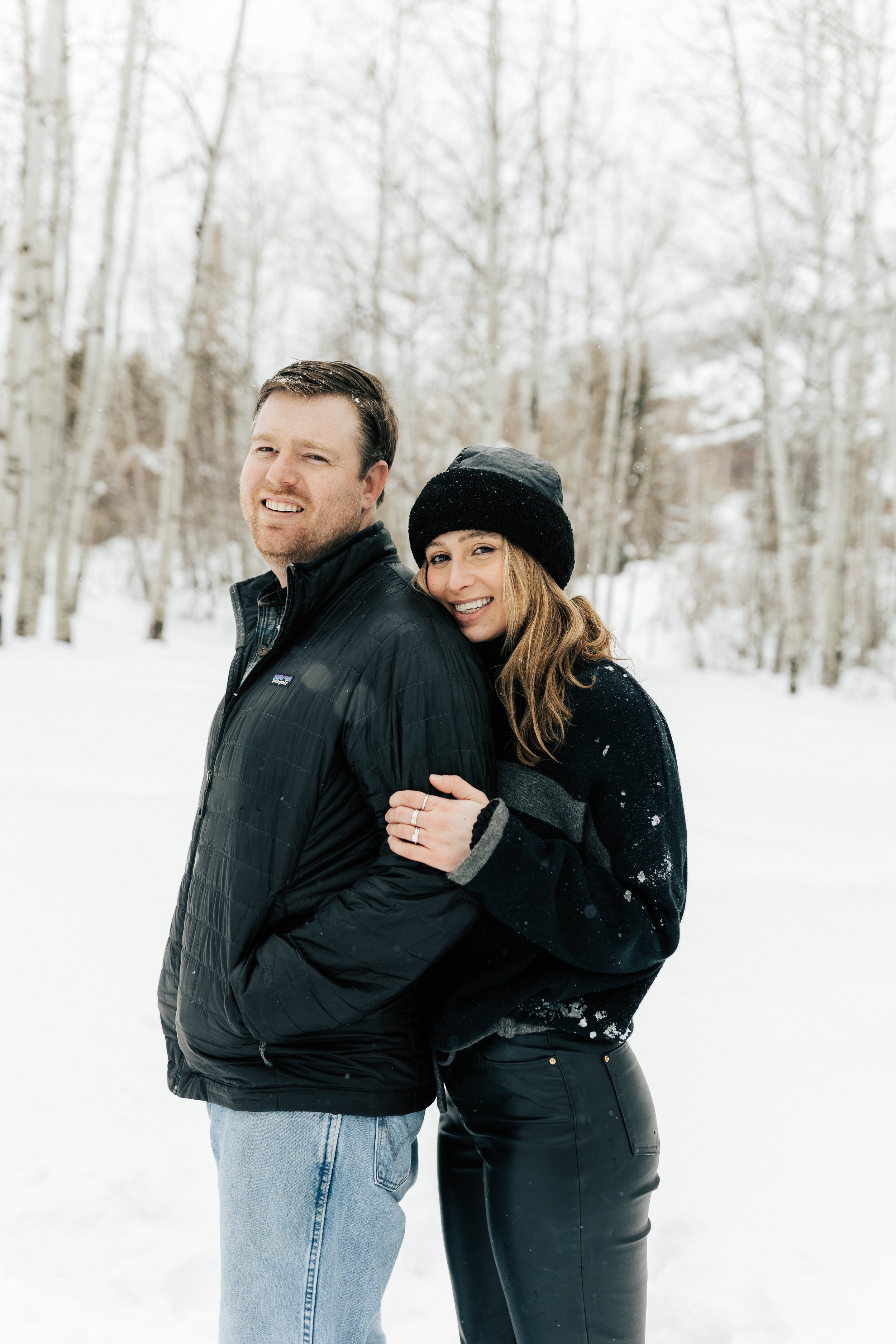  Newly engaged couple. Winter engagement session in Park City, Utah. Boyfriend surprises girlfriend with wedding proposal during a snowy photoshoot. Man proposes to girlfriend. #parkcity #engagements #engagementsessionn #proposal 