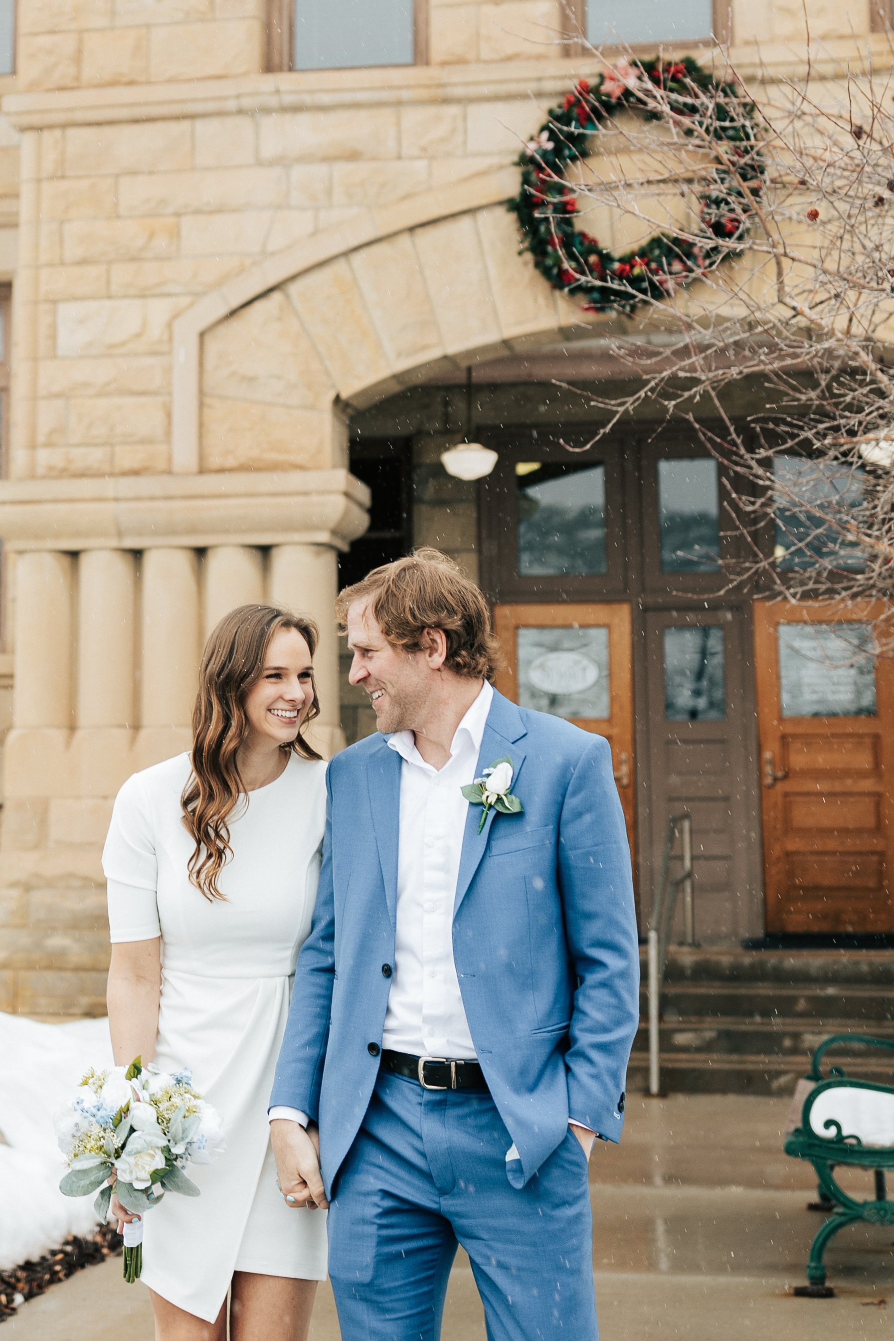  Snowy elopement just before christmas photographed by emily jenkins photo at the summit county courthouse in coalville utah park city elopement how to elope in park city utah mountain winter wedding photographer #elopement #parkcityutah #parkcity #p