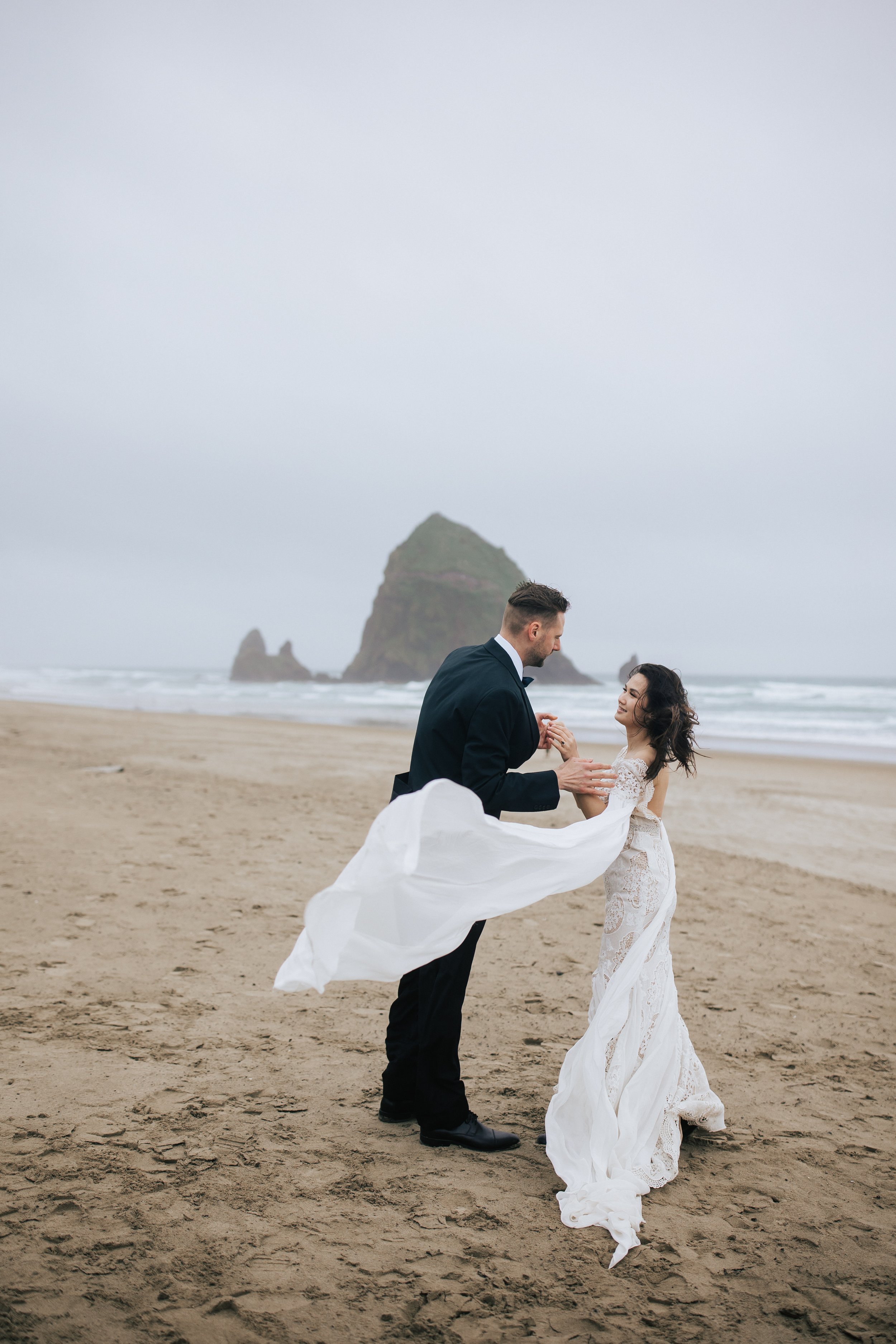  Looking for a peaceful wedding? plan your elopement to cannon beach for stunning photos like these pnw beach elopement emily jenkins photo wedding photographer in pacific northwest elopements #pnw #pnwwedding #pnwelopement #cannonbeach #cannonbeache