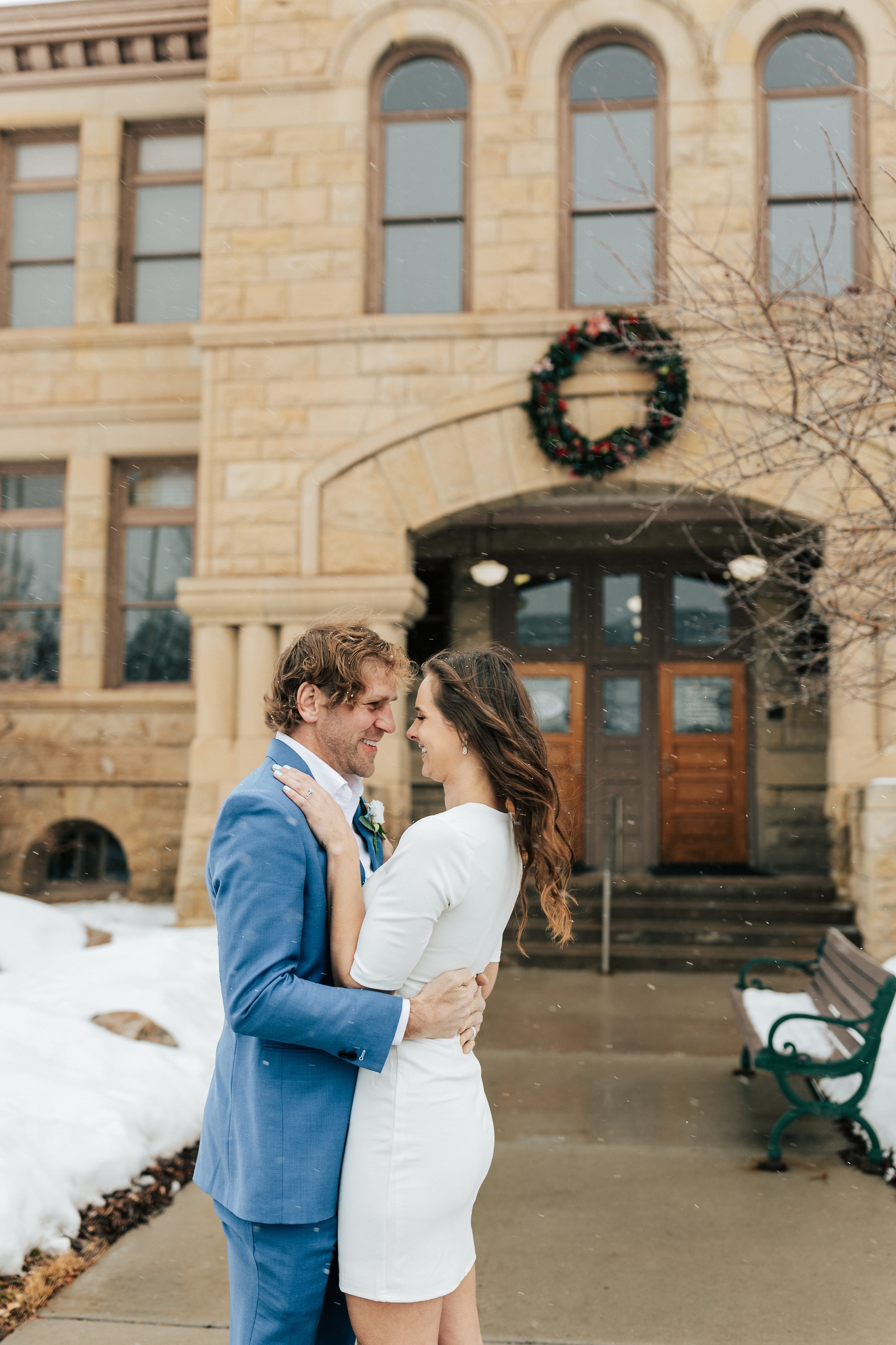  Stunning snowy winter wedding photos outside coalville utah courthouse summit county courthouse is where you elope if you plan a park city elopement with emily jenkins photo beautiful wedding photos near mountains #elopement #parkcityutah #parkcity 