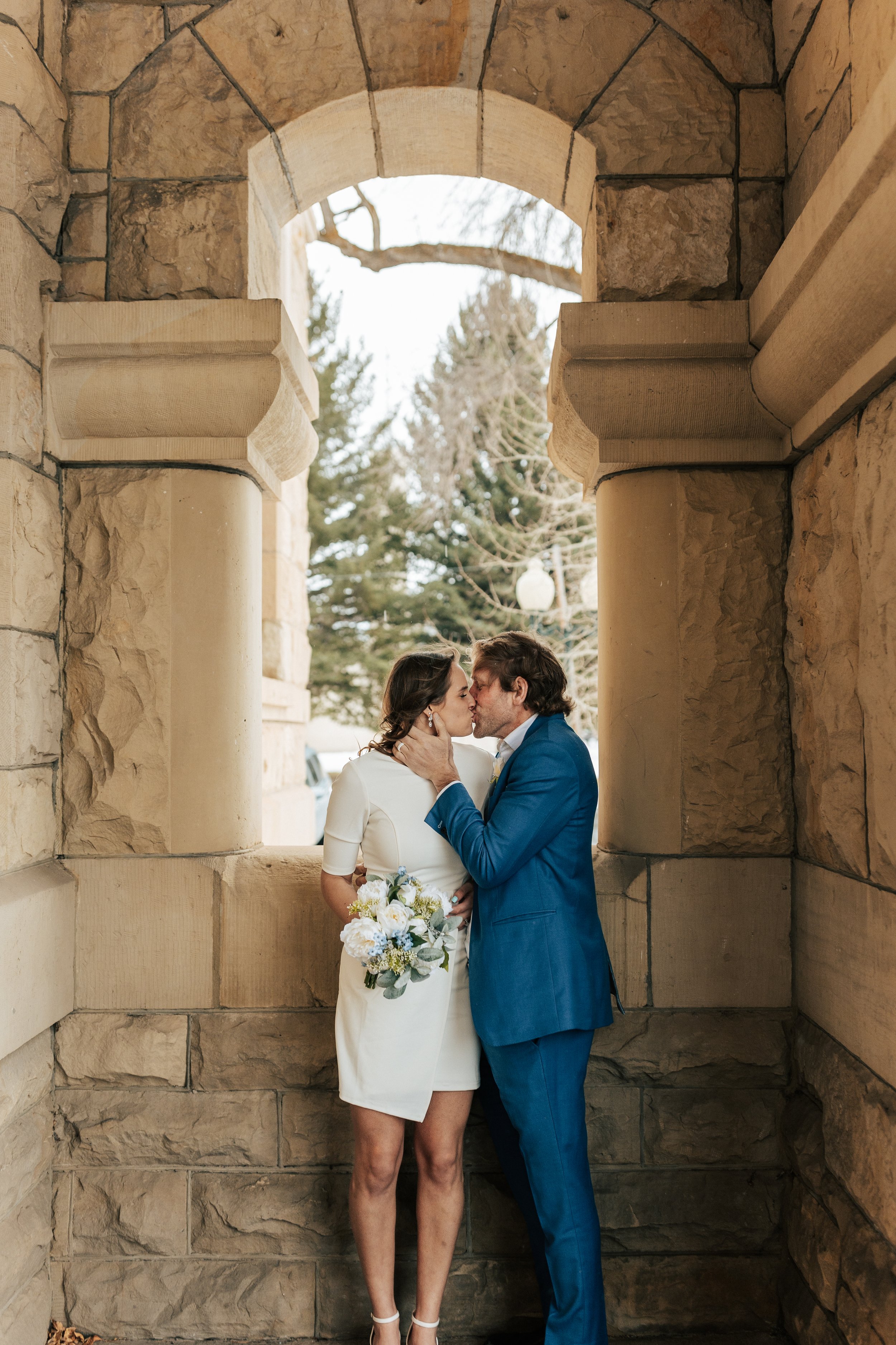  how to get good formals wedding pictures in winter park city utah wedding photographer emily jenkins photo summit county courthouse elopement plans in park city mountain wedding photos winter wedding simple bride and groom #elopement #parkcityutah #