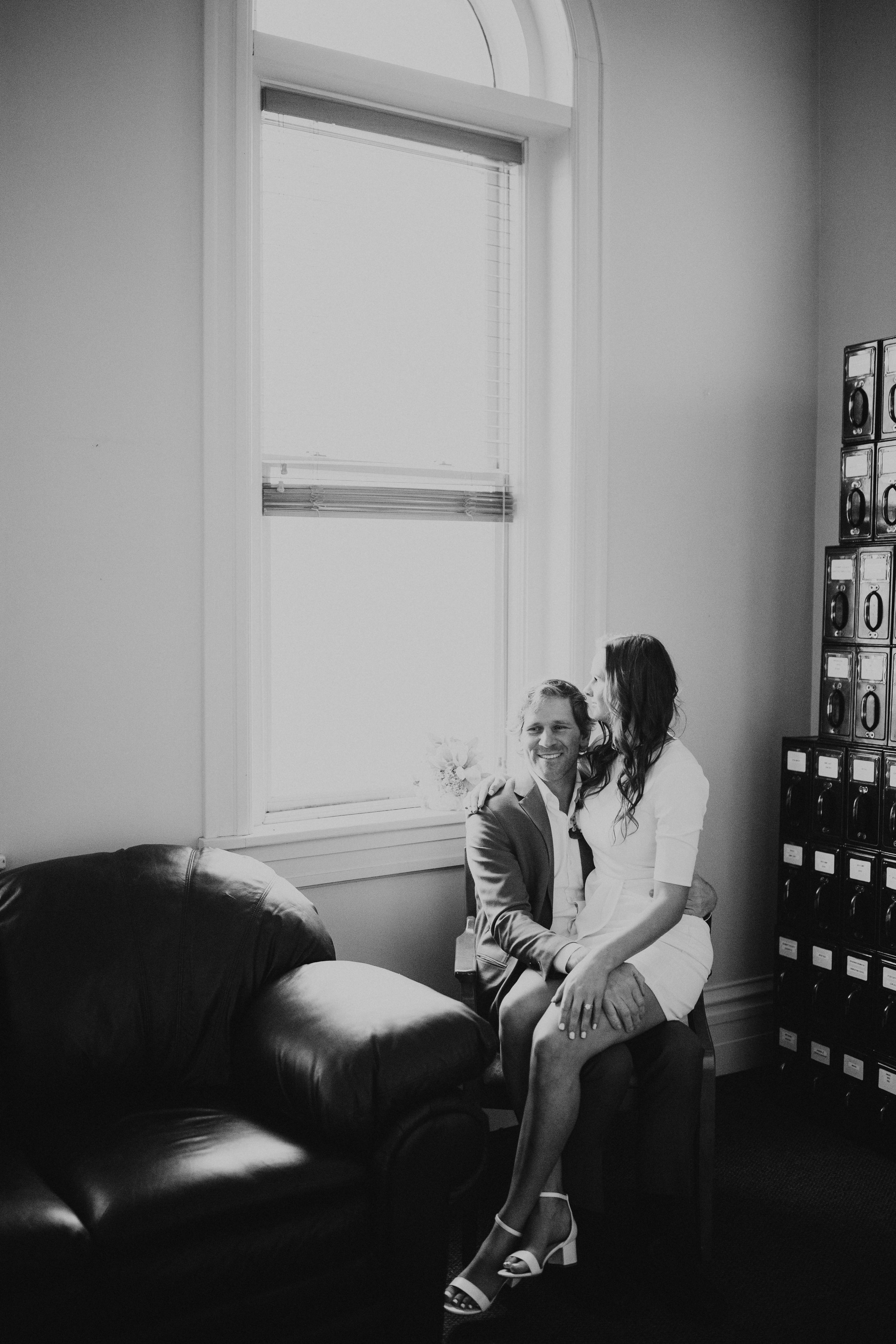  Black and white formal photo of bride and groom simple wedding at summit county courthouse in park city utah elopement photographer for winter wedding photos how to elope in park city adventurous wedding mountain bridals #elopement #parkcityutah #pa