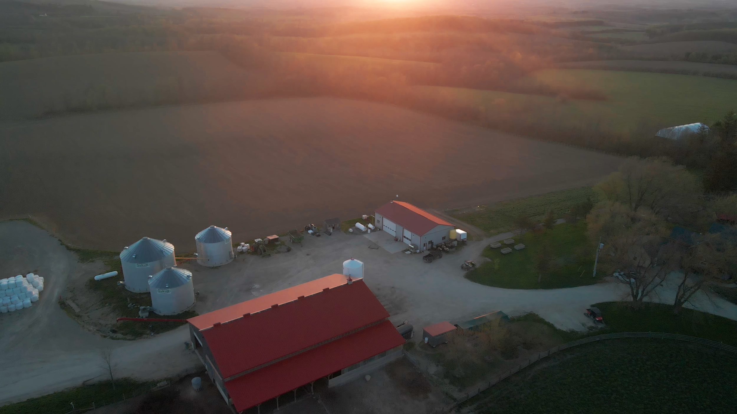 An aerial view of Good Family Farms at sunset. Meaford, ON.