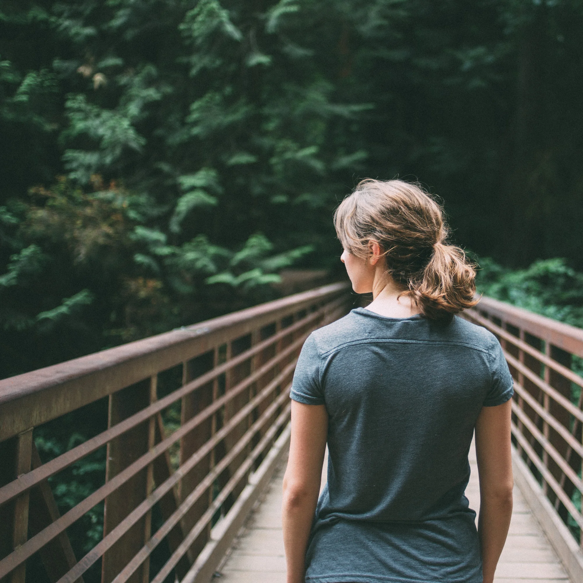 woman-on-bridge-jake-melara-30679-unsplash-crop.jpg