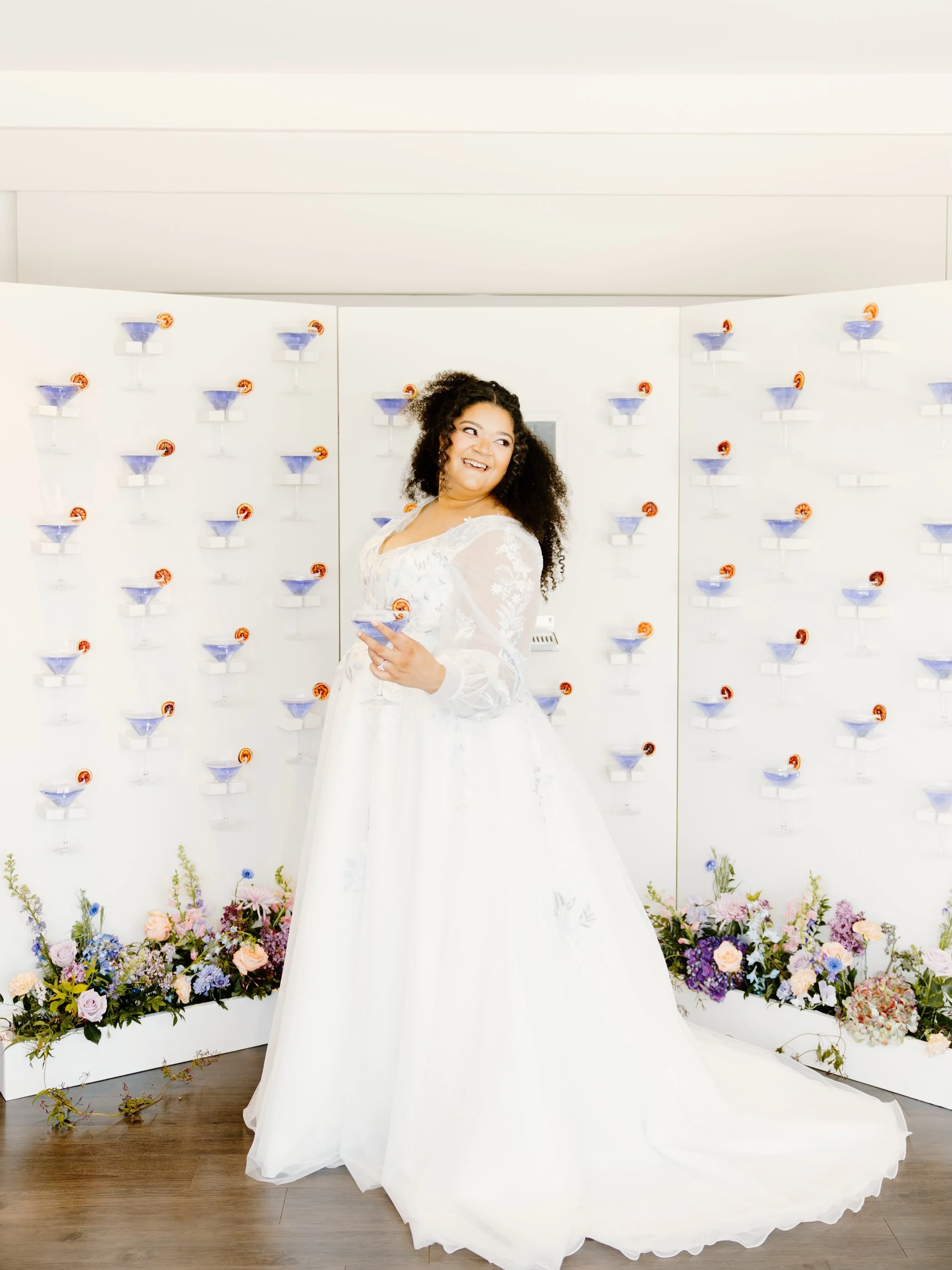 When the cocktails are also the decor >>> 

Photographer: @jordanlyndseyphotography 
Martini Wall: @kccocktailcompany 
Florals: @sweetchamomilefloral 
Dress: @high_vibe_bride 
Model: @philosofi.celebrations 

Kansas City Wedding Venue | Kans