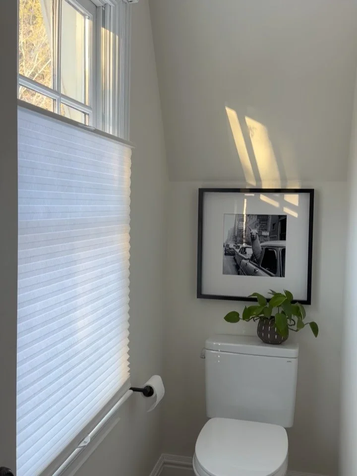 Our design for this bathroom was initially more masculine since it&rsquo;s used by my teenage son.  The blue subway tile hung in a contrasting linear pattern is the stand-out in this space.  We paired it with a floor tile inspired by bamboo to give t