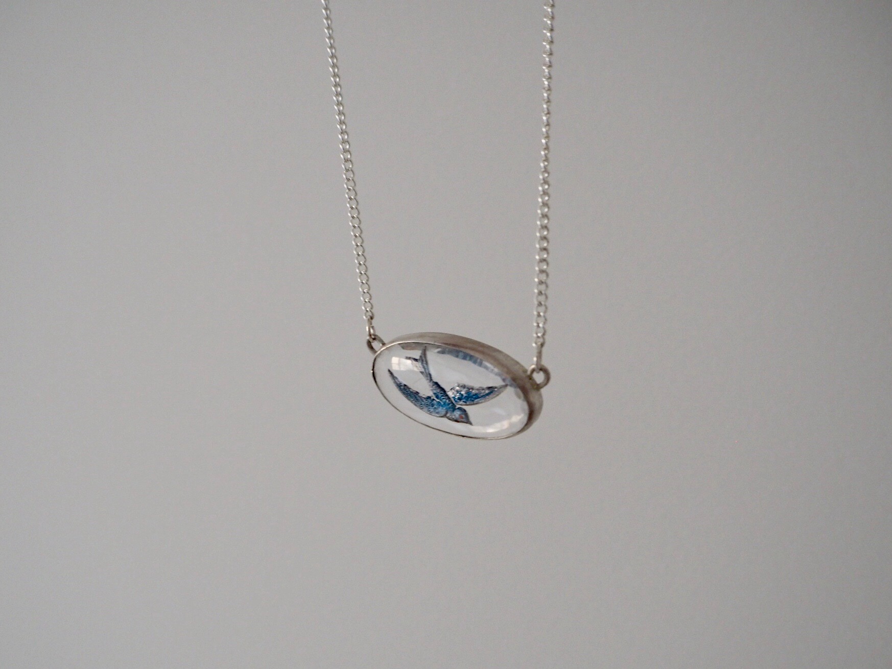 blue birdie necklace.jpeg