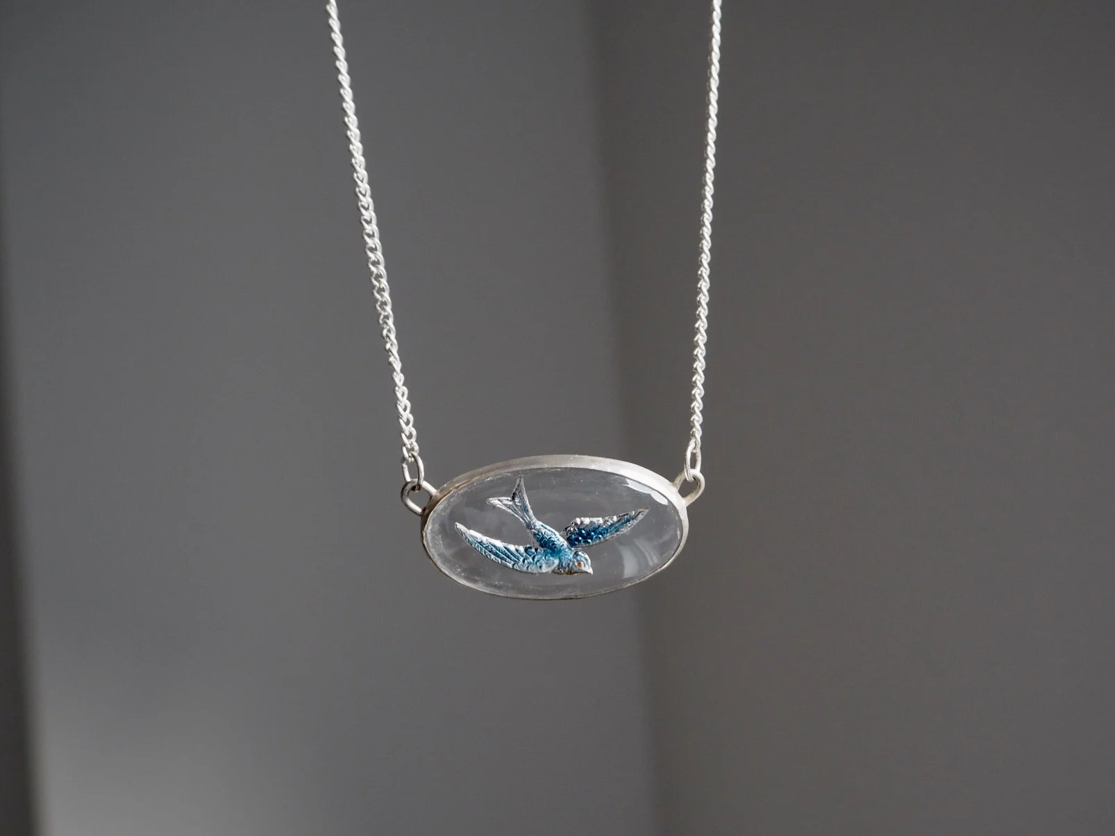 vintage blue bird charm.jpeg
