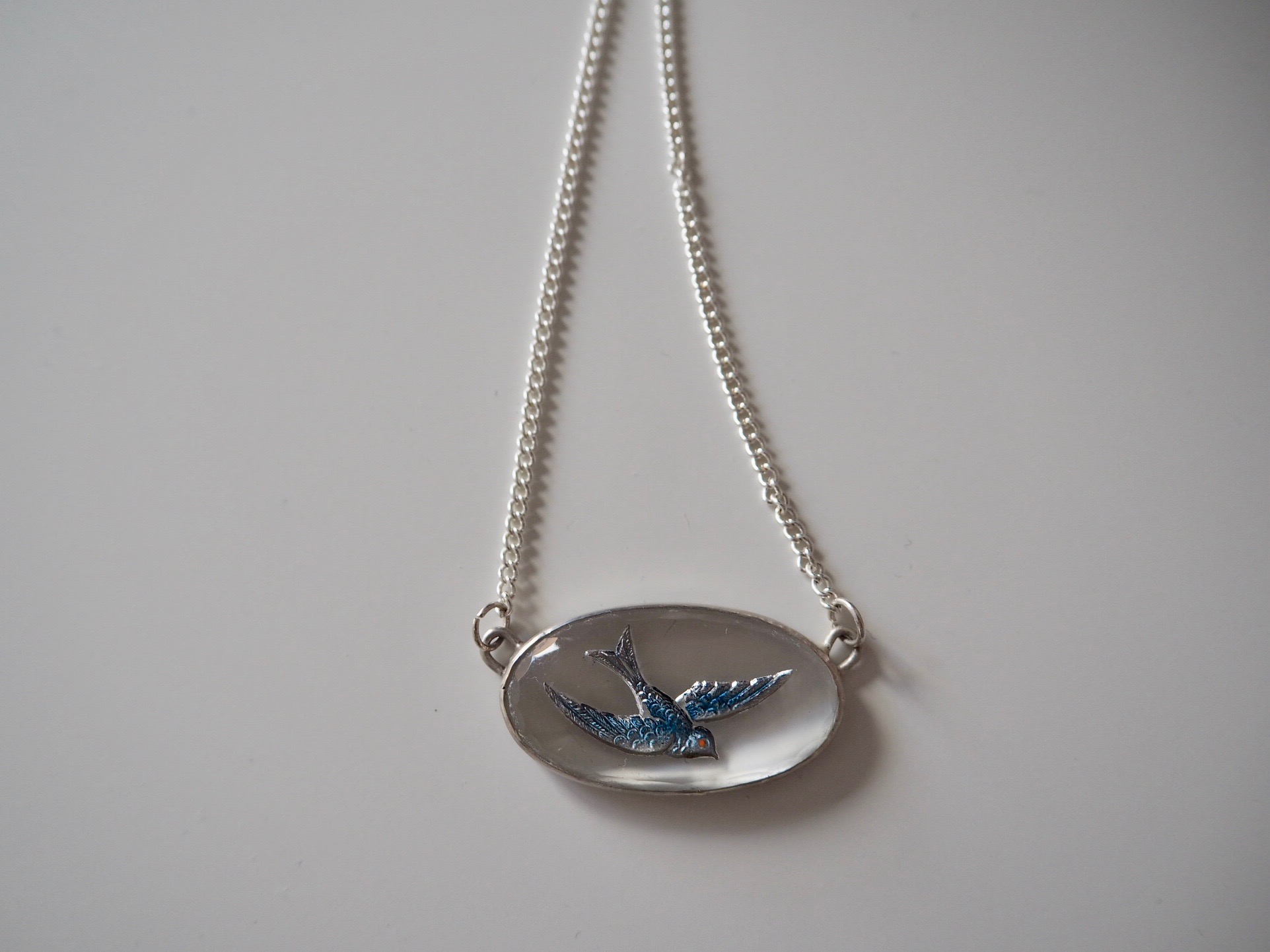 vintage glass blue bird.jpeg