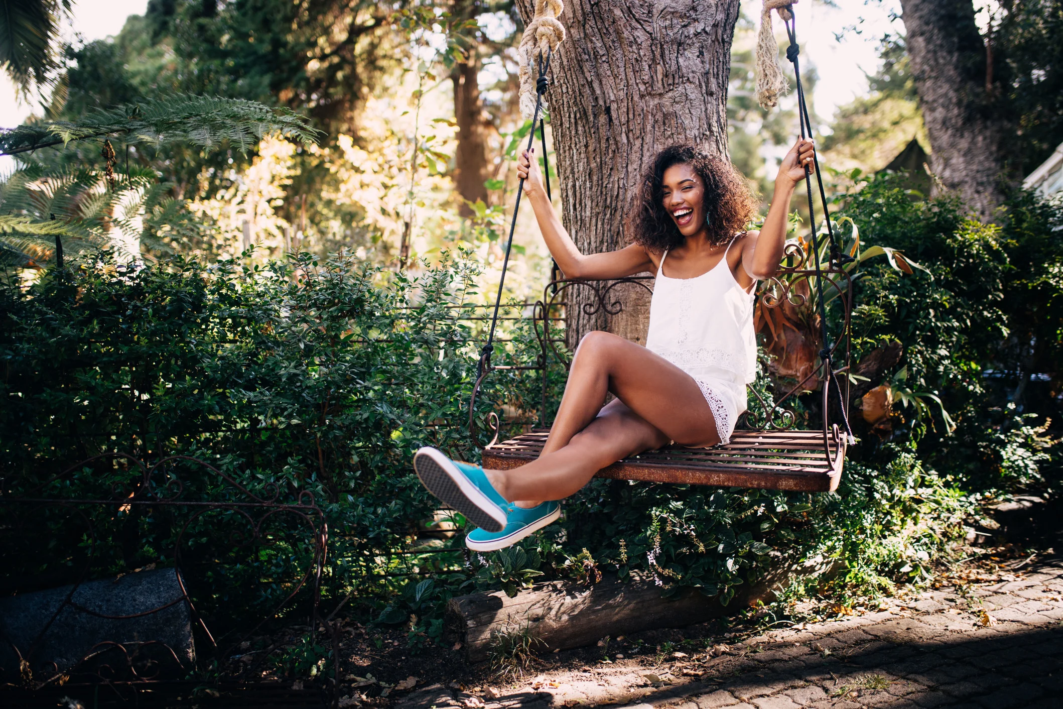 garden-summer-fun-swing-smile-woman-happy-mixed-race-afro-american-outdoor-living-space_t20_XQLr03.jpg