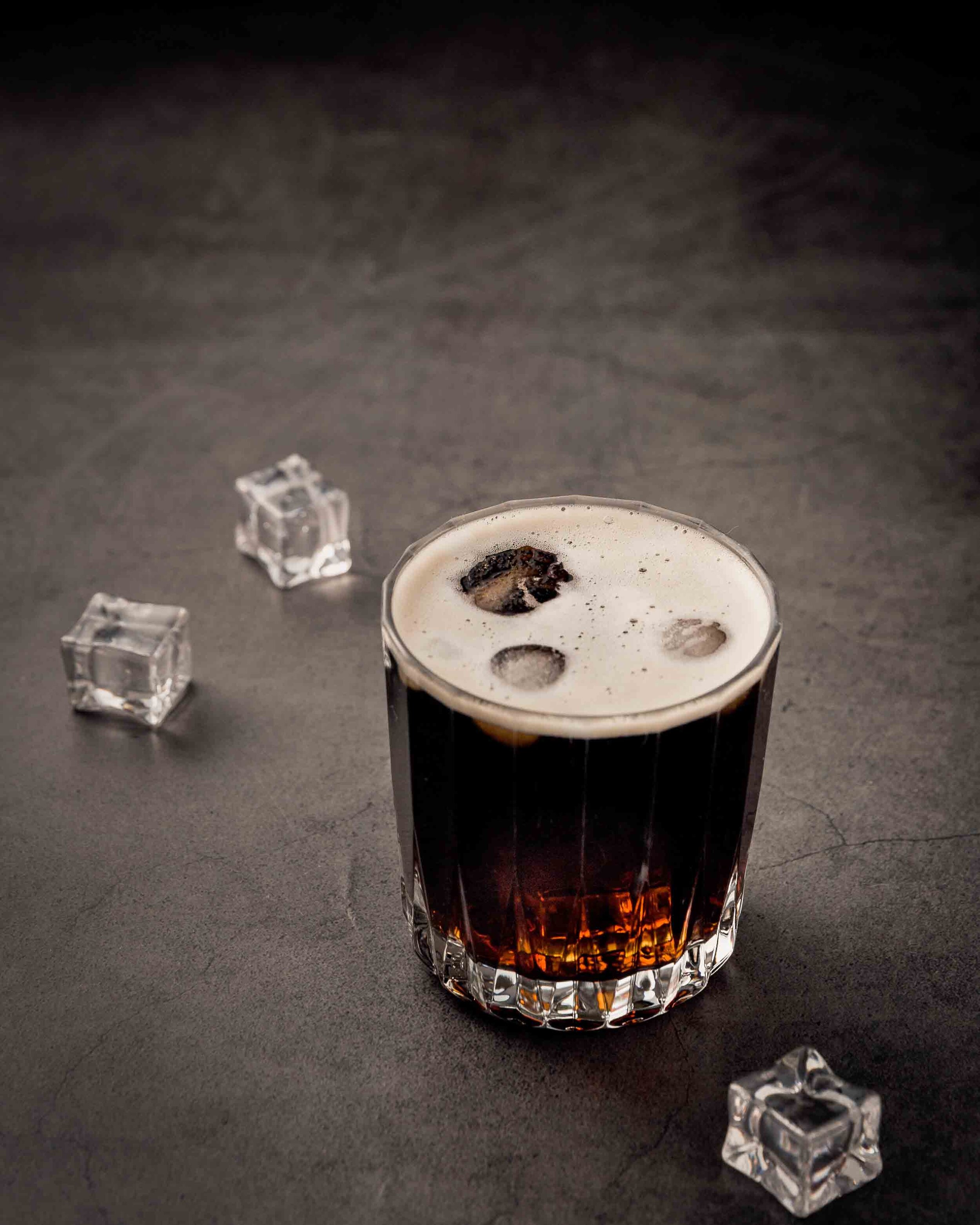 https://images.squarespace-cdn.com/content/v1/5c2e3c55cc8fed84a08c0f14/1575061077712-WOCM94E3KPA0QLQ5DUYB/Spicy+Whiskey+and+Coke+-+Fireball+Whiskey+Drinks+by+the+Drink+Addicts.jpg