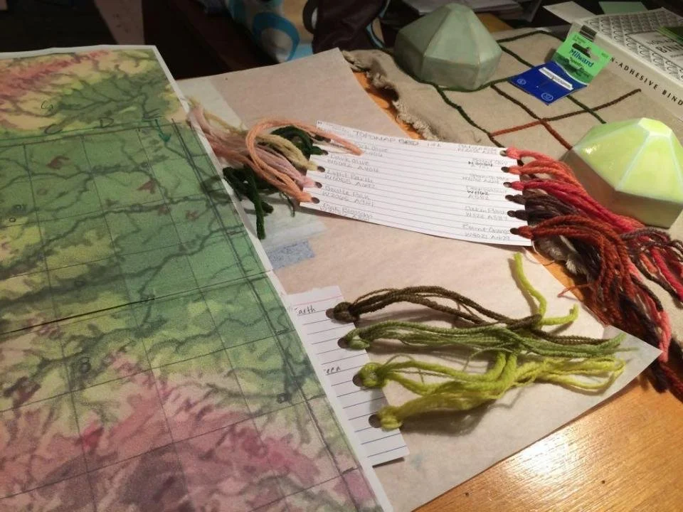 studio with yarn and map.jpg