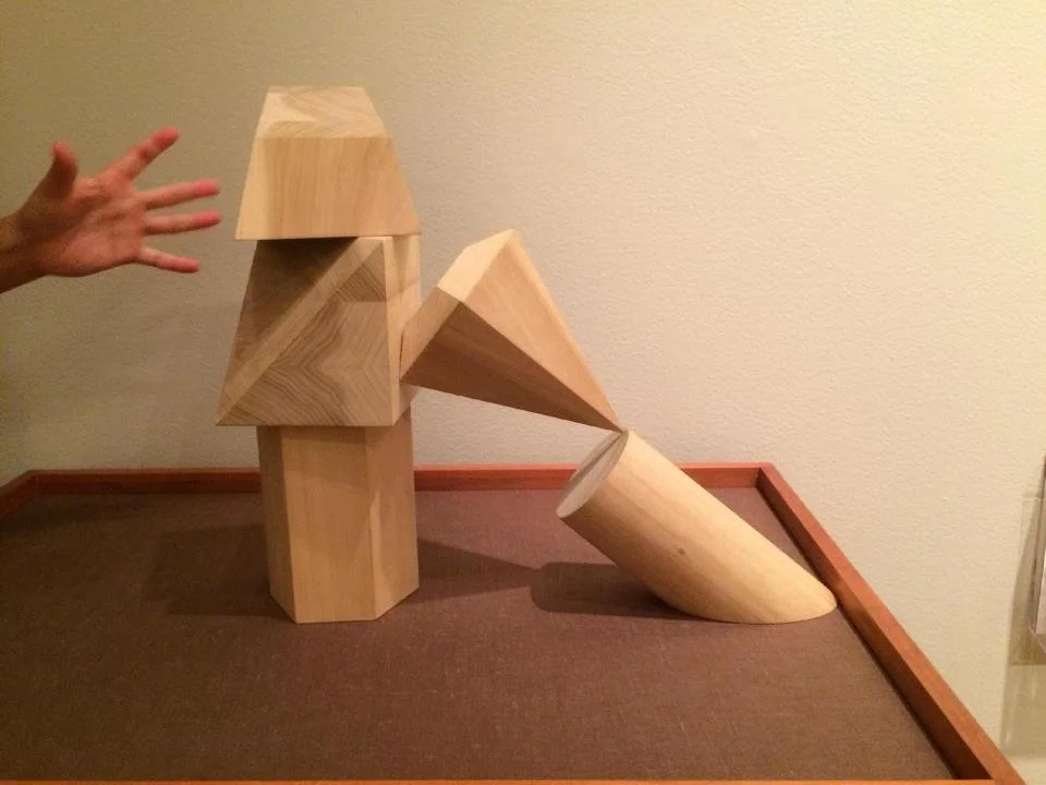hand with geo forms.jpg