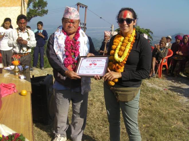 Former Namlo executive director, Lorena Garcia, with the Raghu School head Master at the inauguration for the Raghu Secondary School.