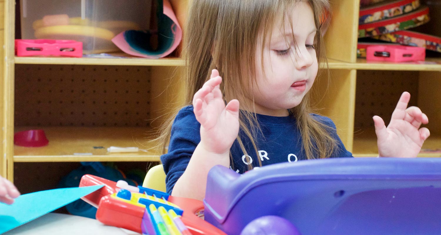 toddler-with-toy.jpg