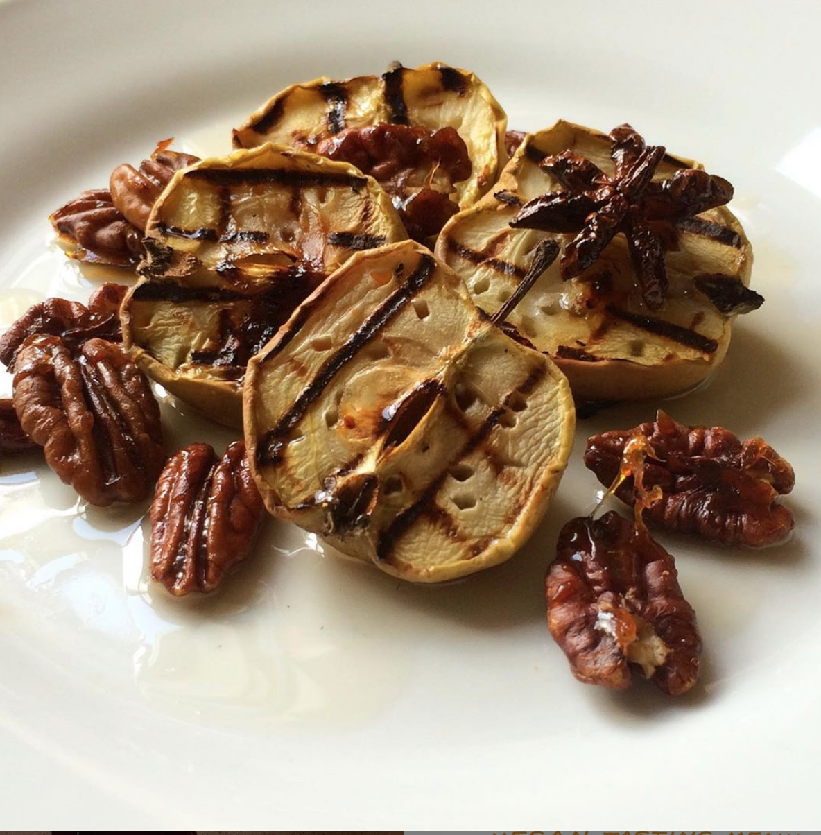 Charred baby apple with candied pecans and star anise syrup