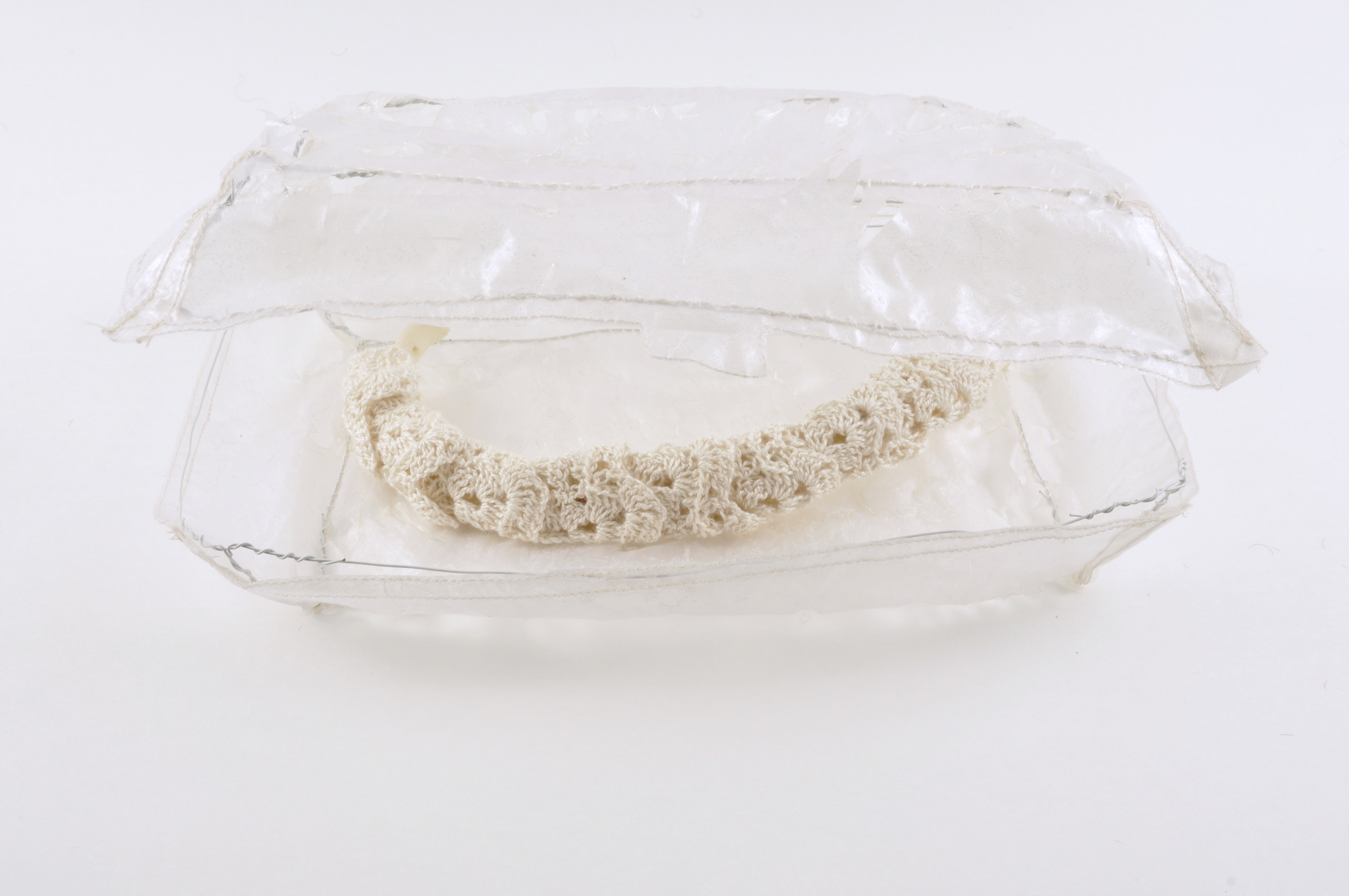 Meanwhile my mother is in the kitchen by herself, raving about how good some leftover ribs are that she found in the fridge. I want to be sick. laser cut silk organza, silk gossamer, dissolvable fabric, human rib, wire