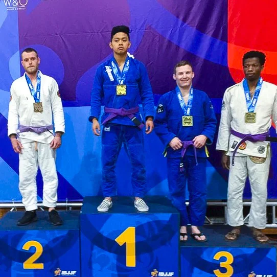 Coach Aaron Hannan took second place in the Adult Male Purple Featherweight division.