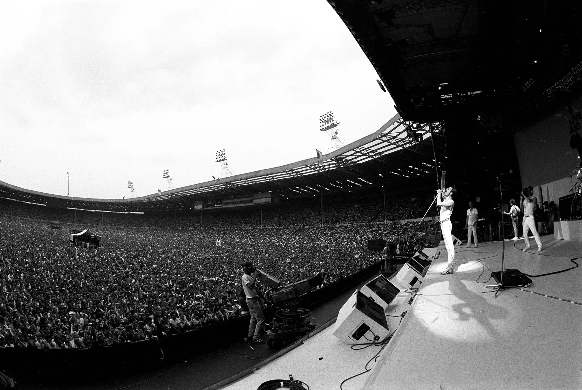 Freddie. Photo Credits: Queen performs at Live Aid in London in 1985. (Neal Preston) from: https://www.cnn.com/interactive/2018/11/opinions/queen-live-aid-cnnphotos/