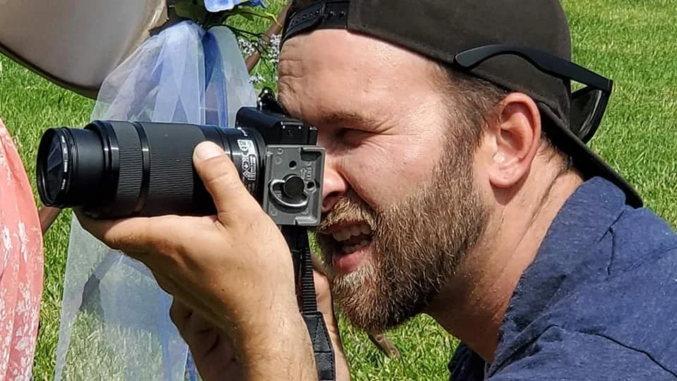 derek Cam staff shot.jpg
