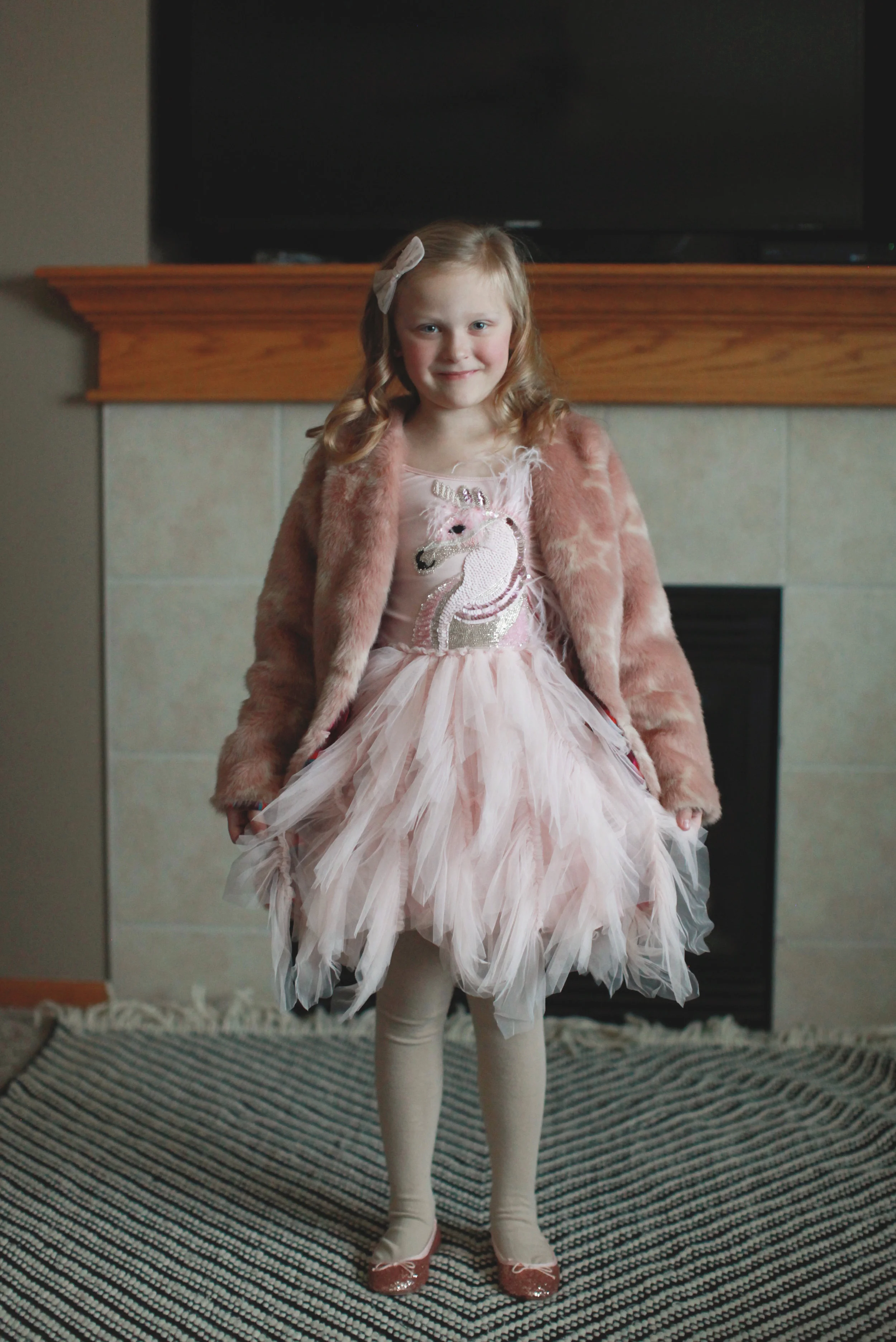 Fun Fact: I got this coat from Mac & Mia last fall for her thinking I was being a little extra for having my 6 year old have a faux fur coat … but she has gotten SO much use out of it. Any time she has been dressed up she wears it (and it looks a lot nicer than her everyday coat) and if it’s not completely freezing she chooses to wear it instead of her warmer Gap coat.