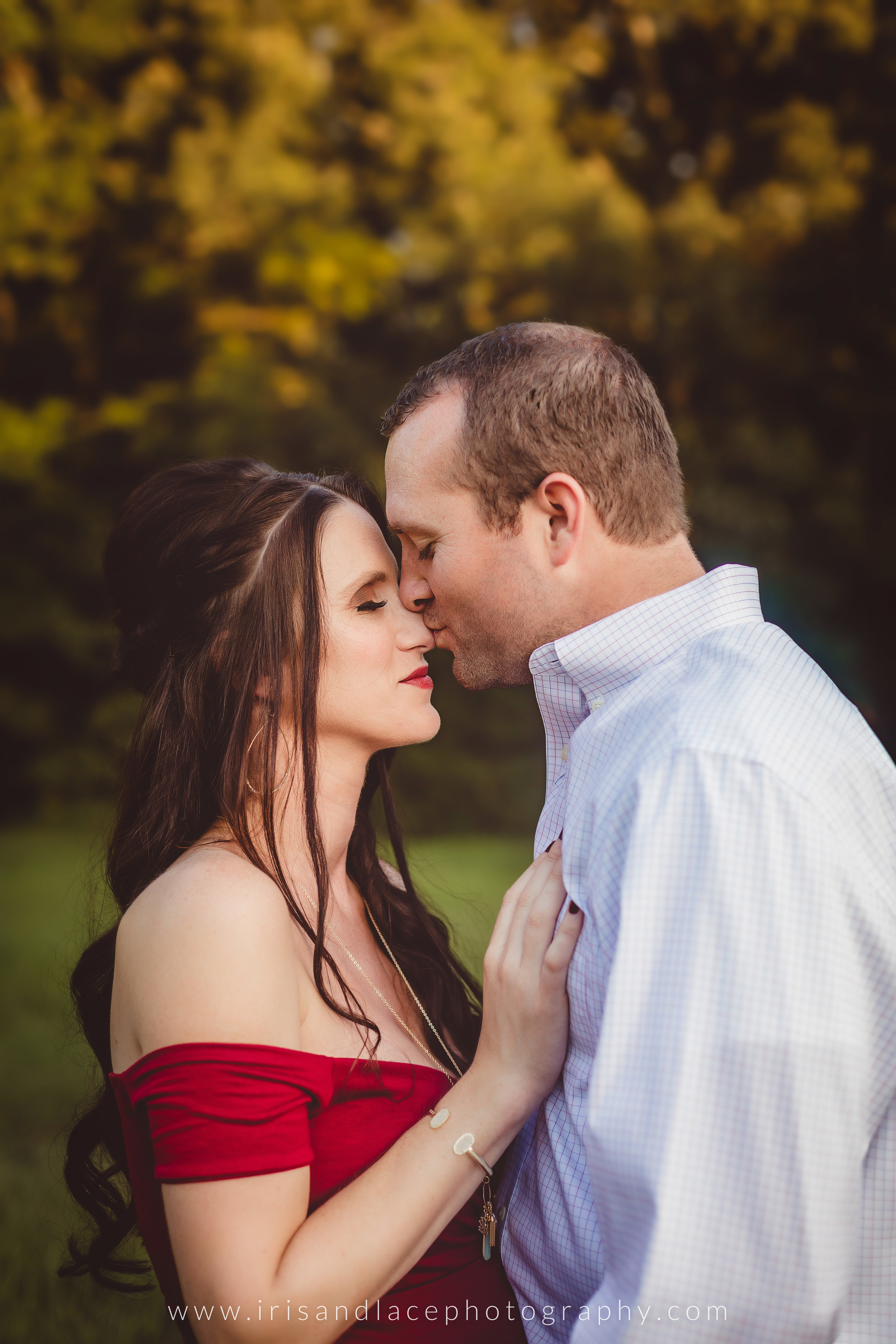 Man kissing wife's nose