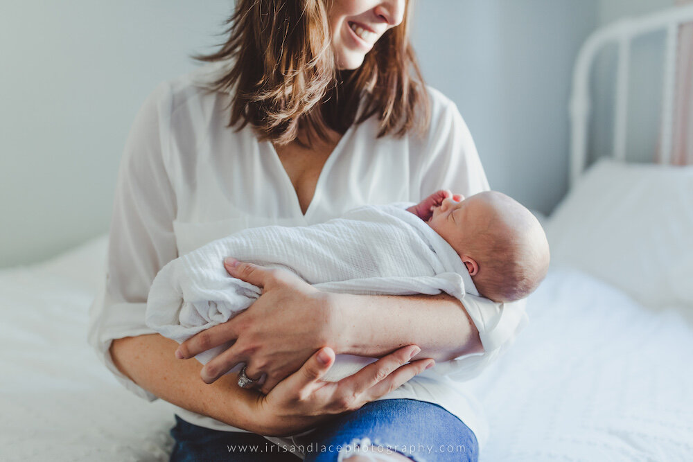 Mother holding Son newborn photography