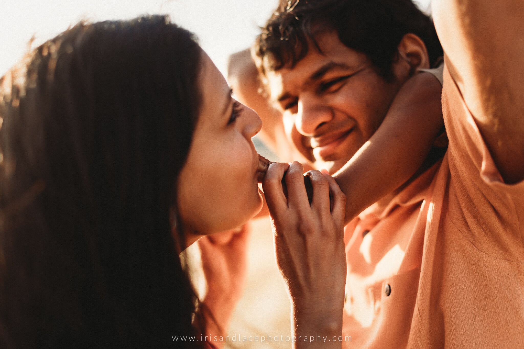 Family Photos near San Jose, CA  |  Iris and Lace PhotographyA family of three smile and embrace at sunset in a Bay Area photoshoot outside San Jose, California 