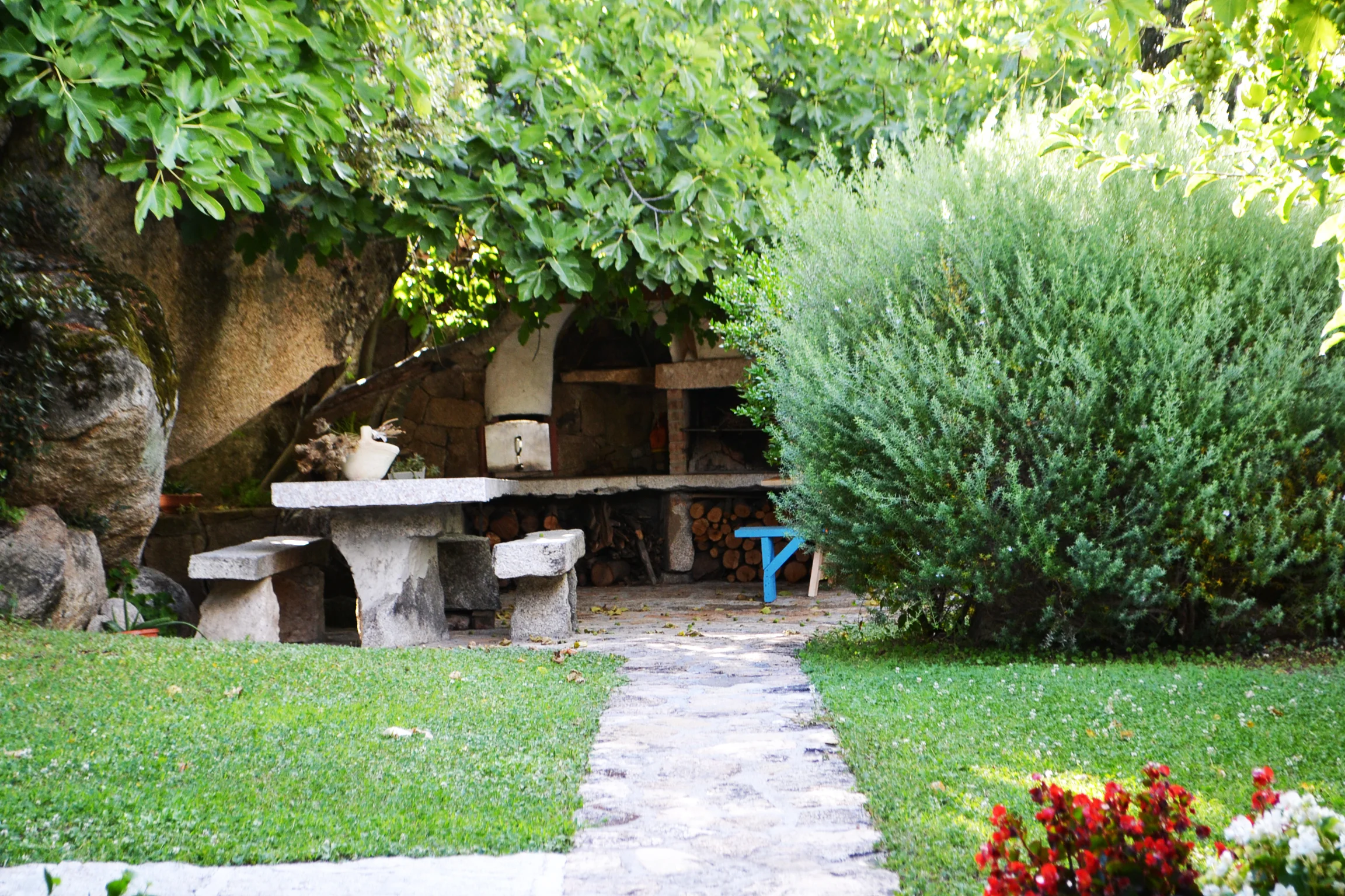 outdoor kitchen and dining area