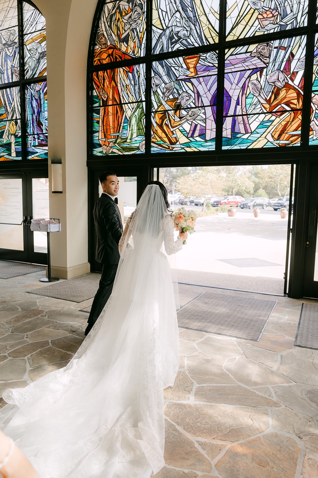 Kim's veil under the stained glass windows, photographed by One and Only Production