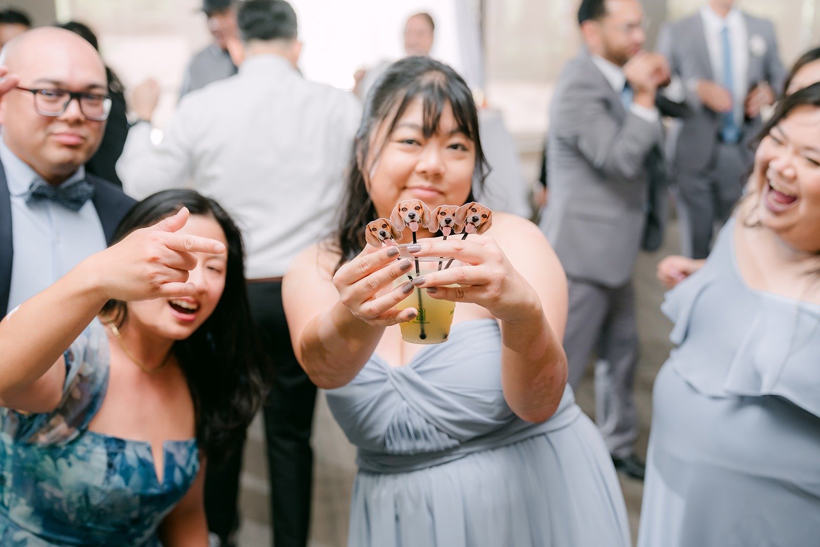 Guests dancing and filming on their phones during open dance