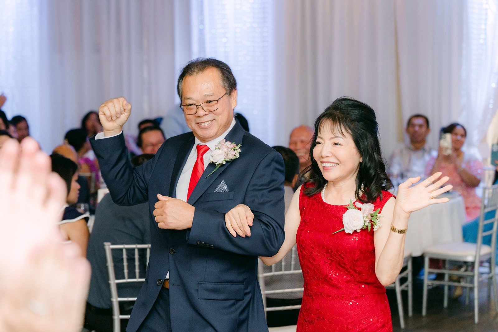 Family cheering as they make their entrance