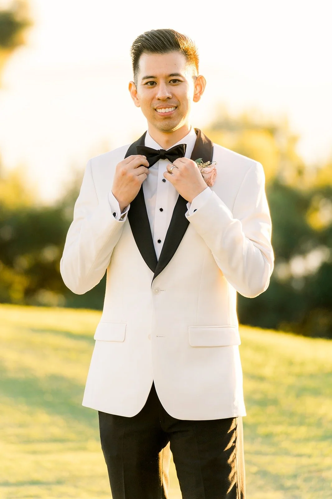 David in a white dinner jacket at golden hour