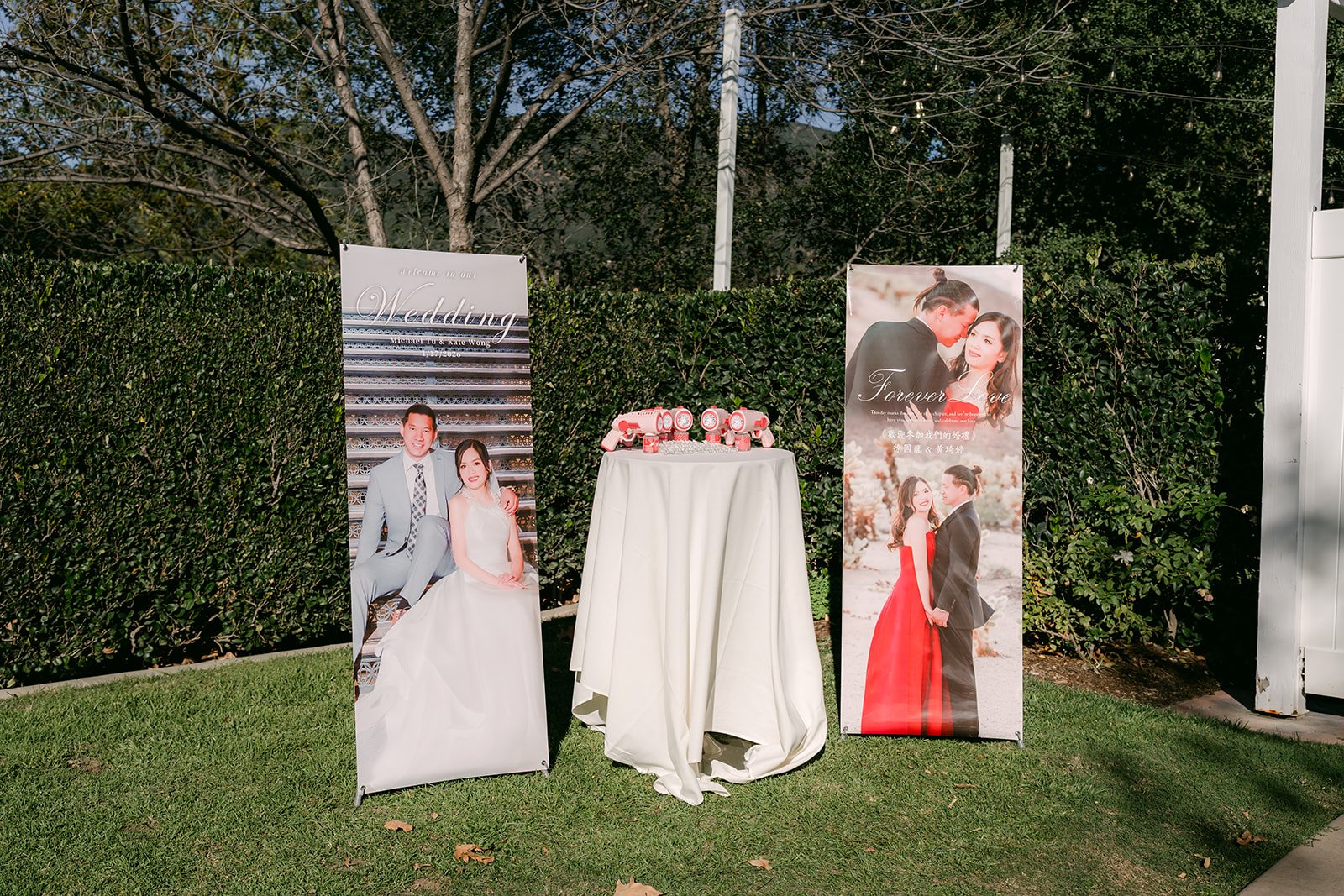 Photo boards of Kate and Michael set up for the ceremony.