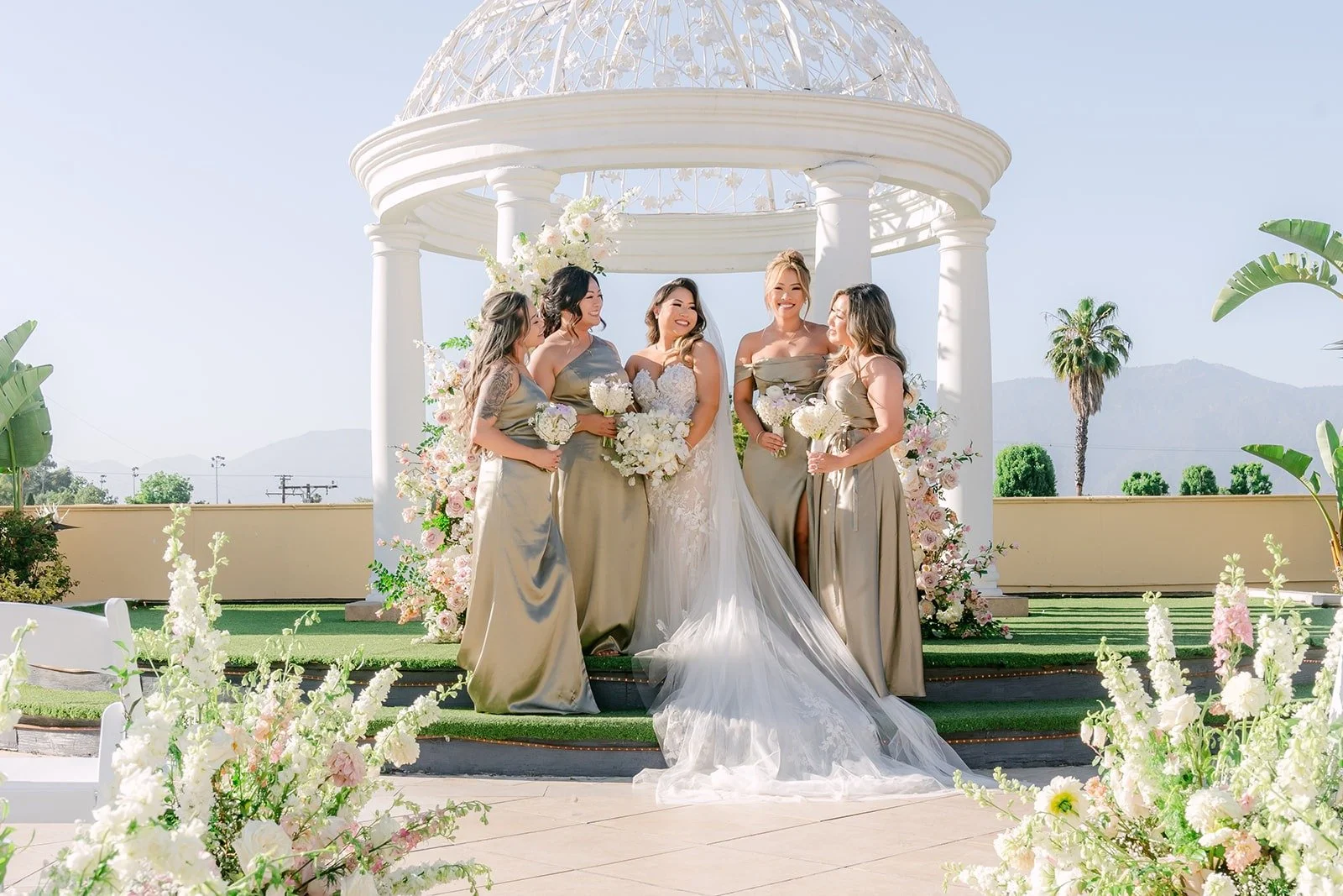 Candice with her bridesmaids at the gazebo on the Garden Terrace
