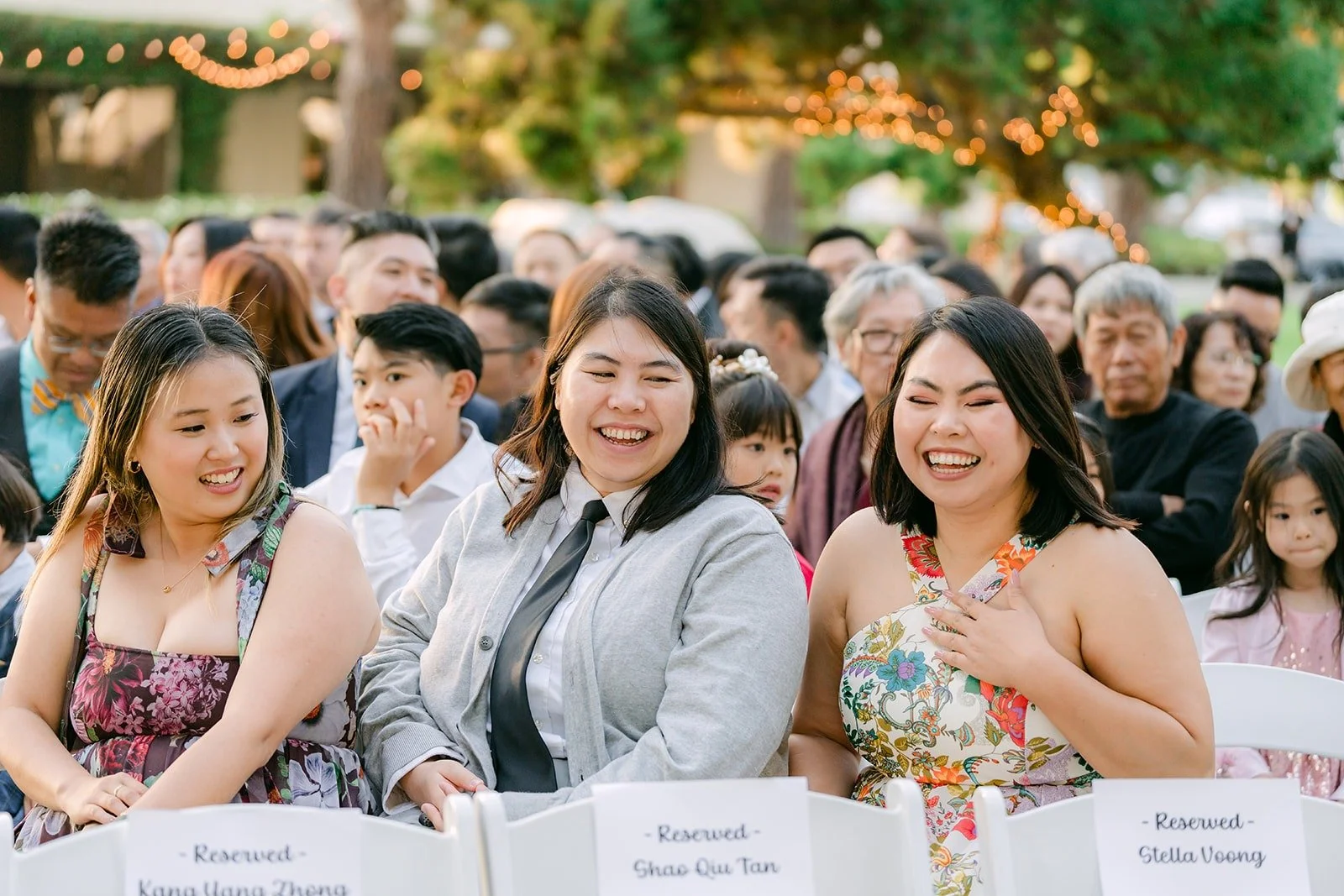 Guests smiling during the ceremony
