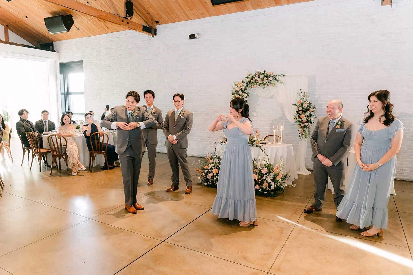 Wedding party dancing into the Great Hall