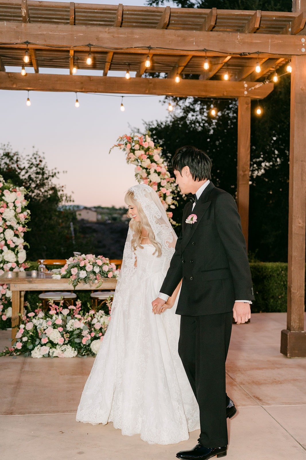 Konitha and Job laughing together at the end of their first dance, photographed by One and Only Production
