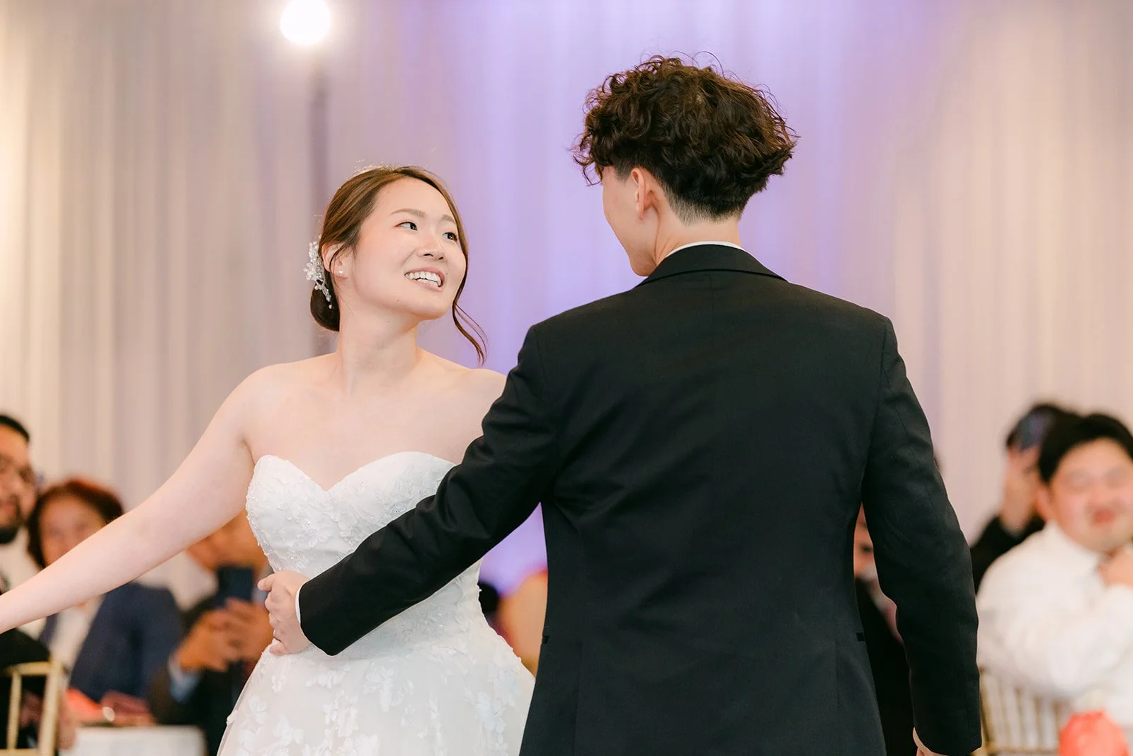 Tony twirling Victoria during their first dance