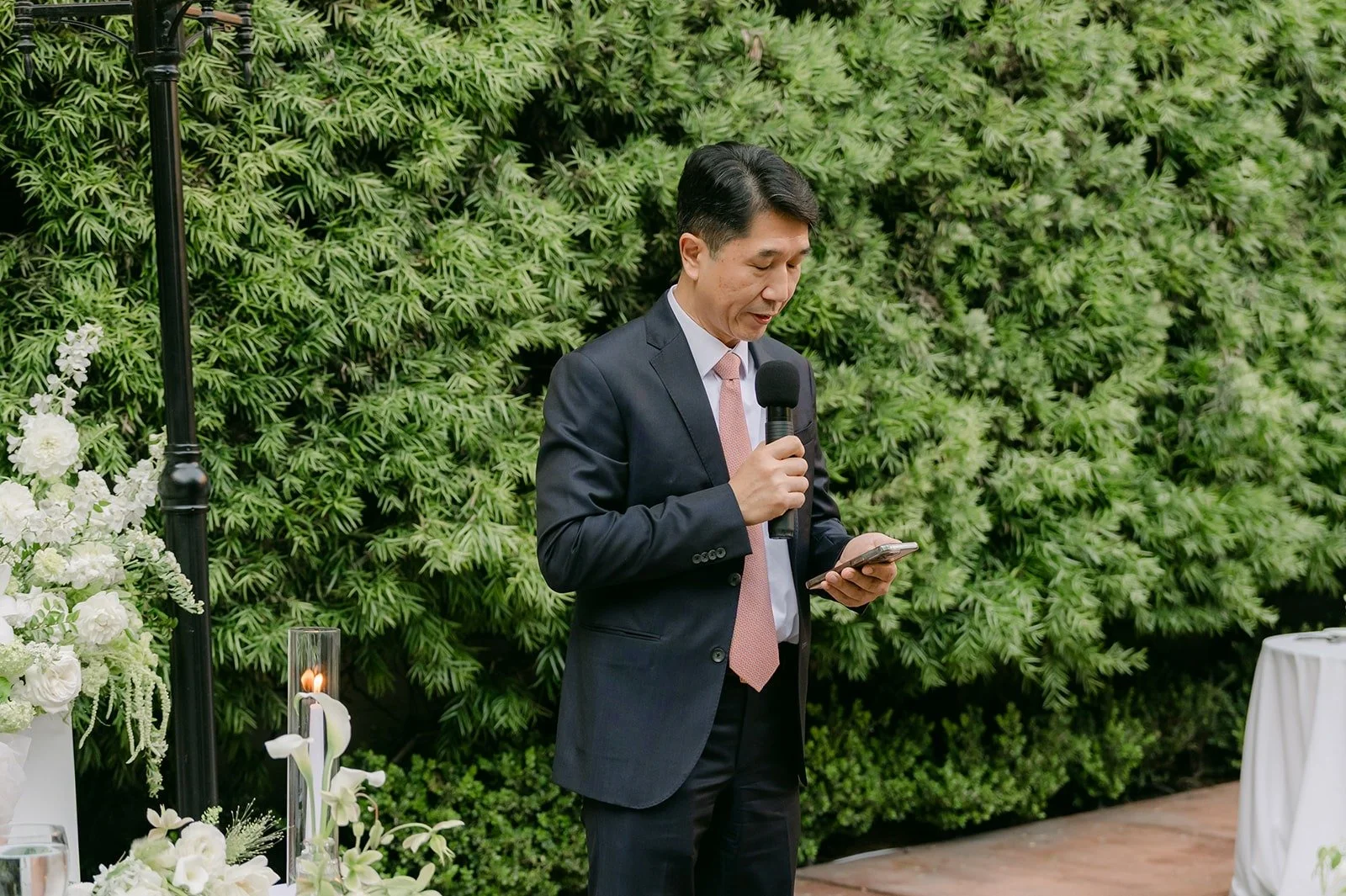 A guest giving a speech in the reception courtyard