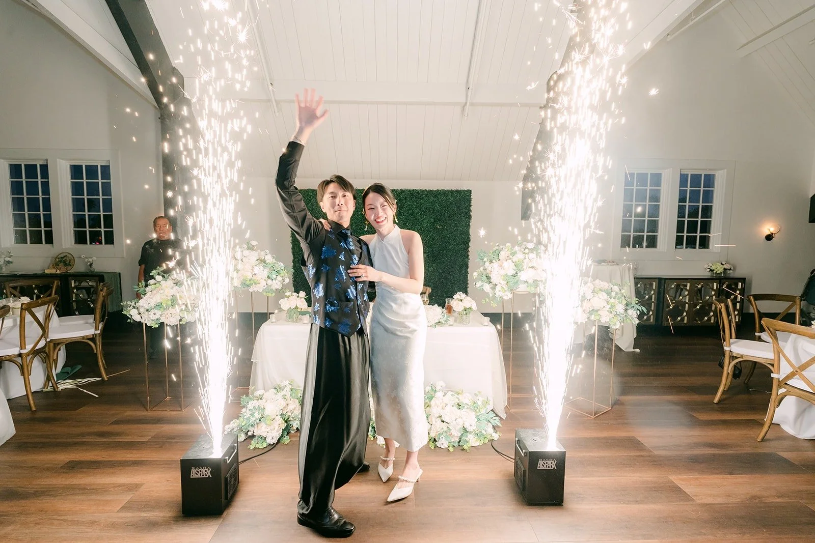 Tin and Fong dancing between cold sparklers