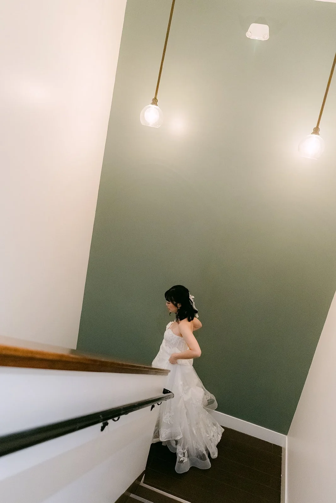 Vivian walking down the stairwell