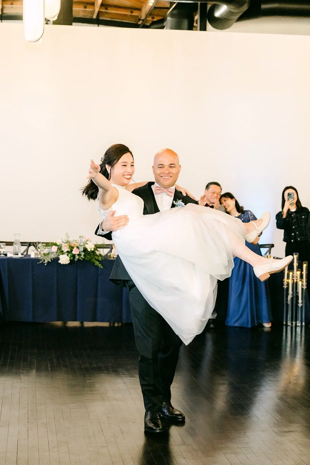 Brandon lifts Elisa during the first dance