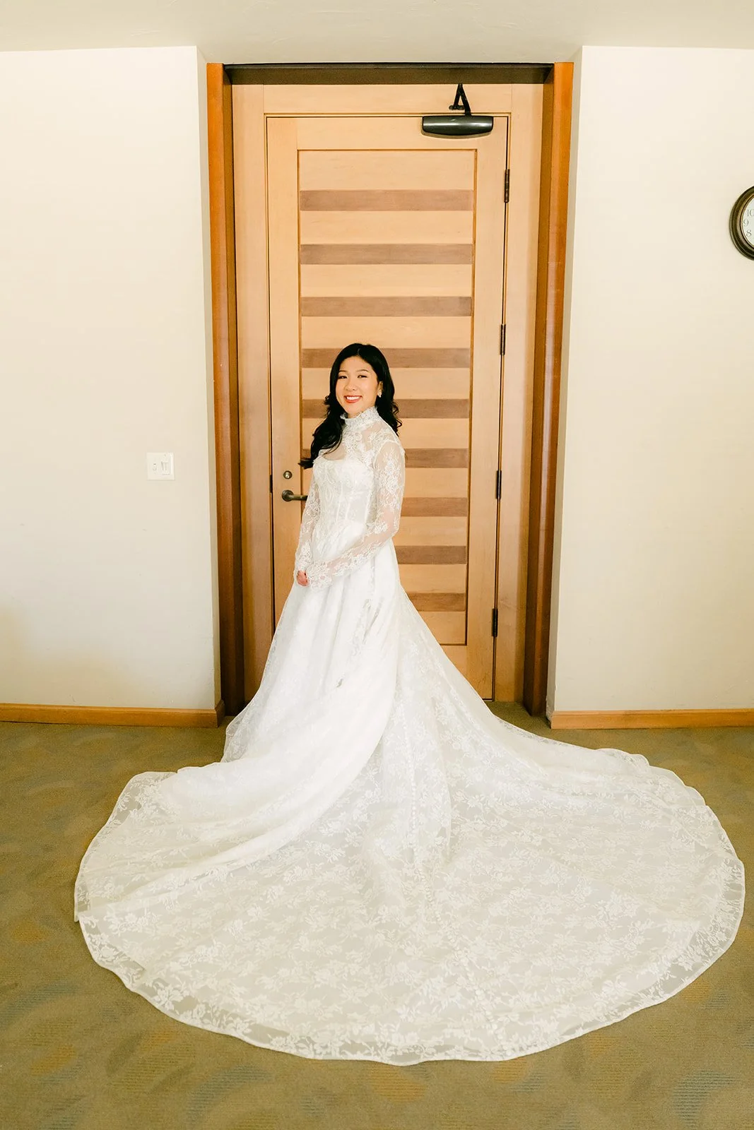 Kim's cathedral train spread out in the bridal suite at St. John Fisher Church