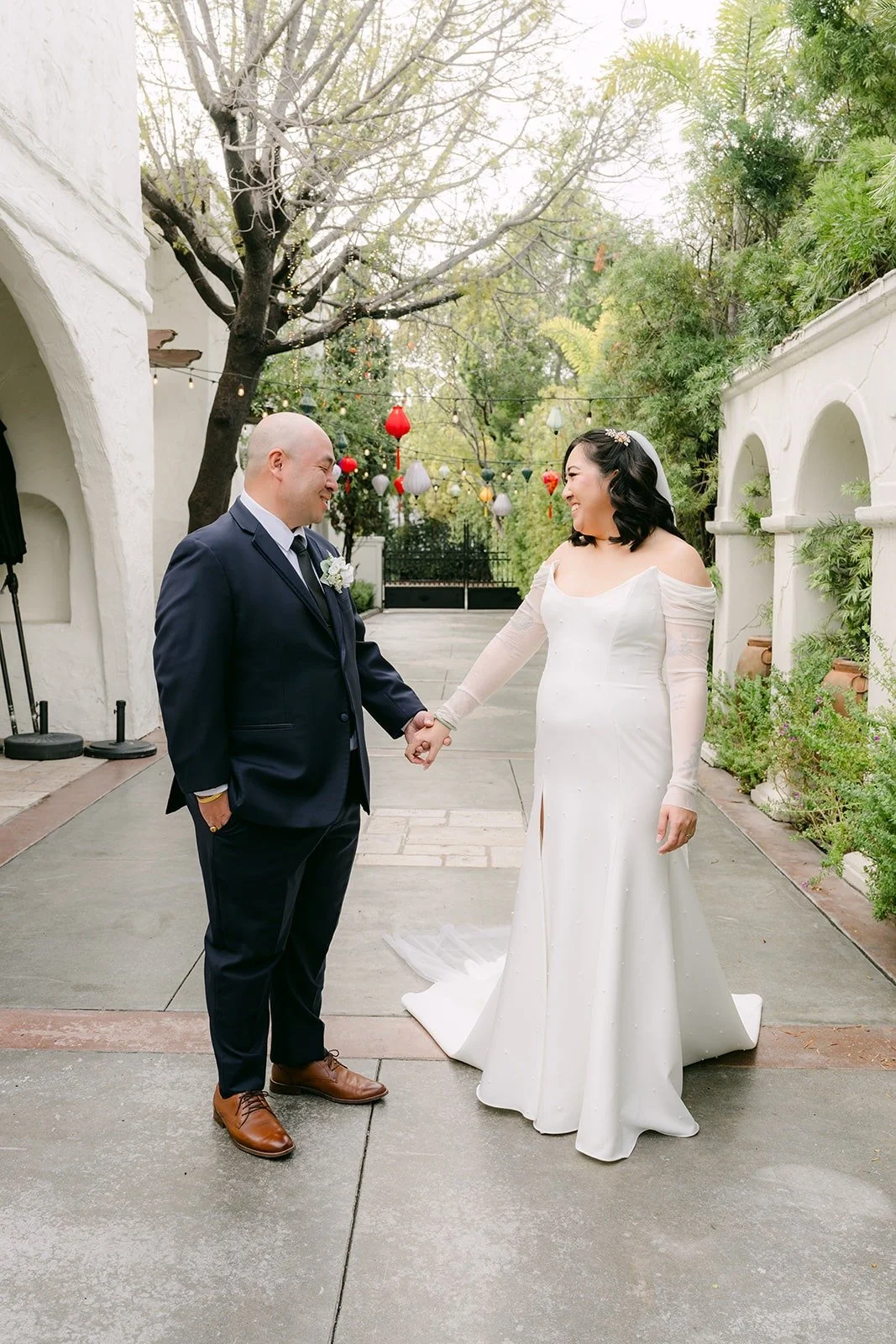 Vivian walking up to Yao in the courtyard