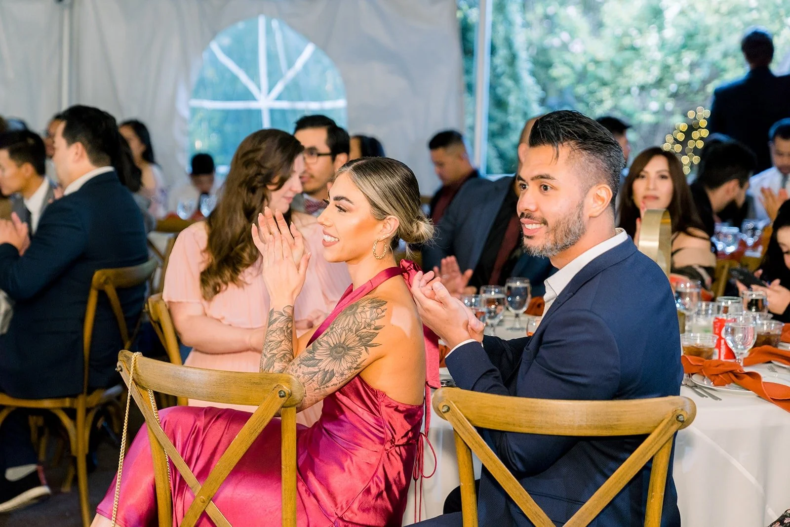 Guests smiling during the speeches